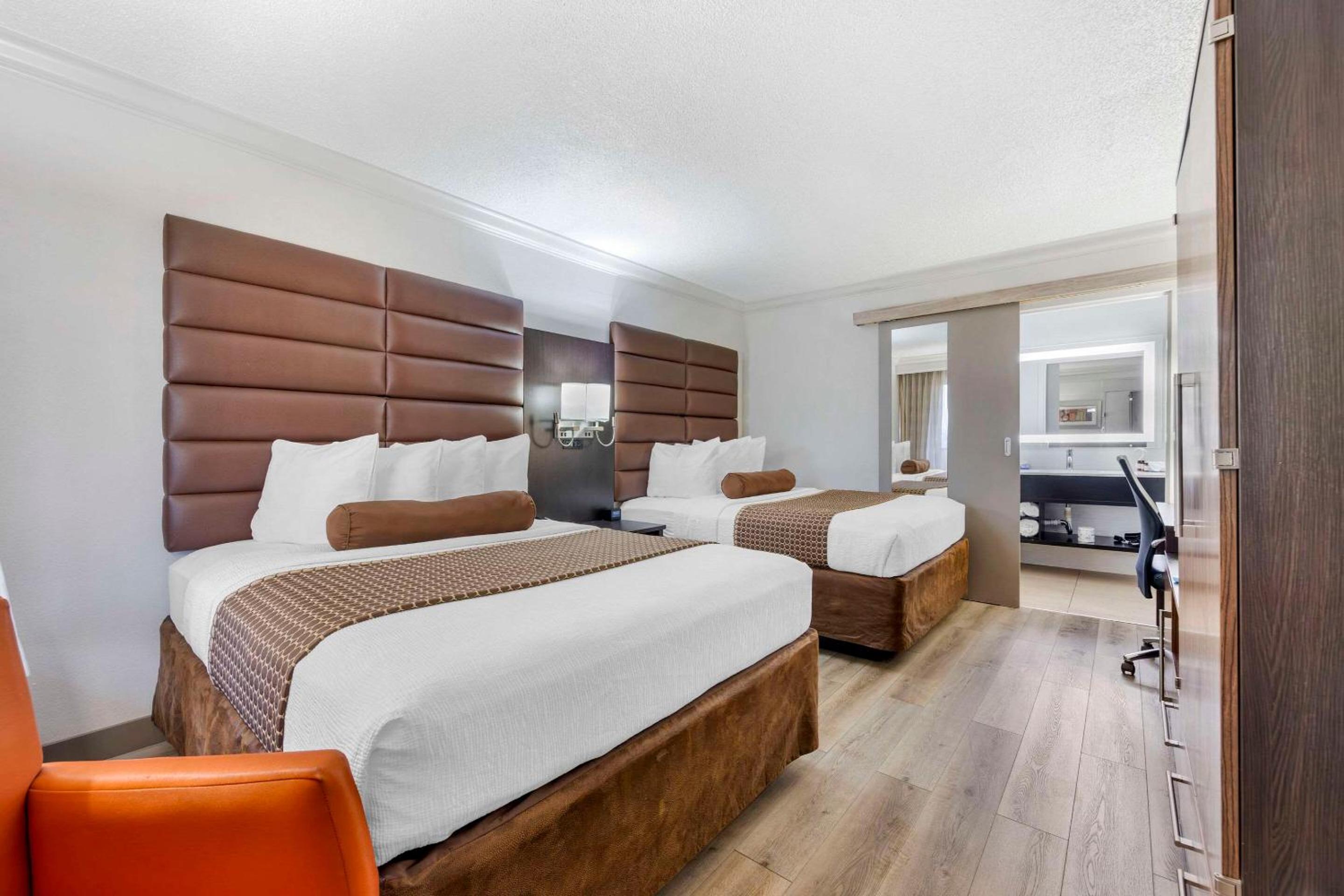 Queen Room with Two Queen Beds - Photo 1
