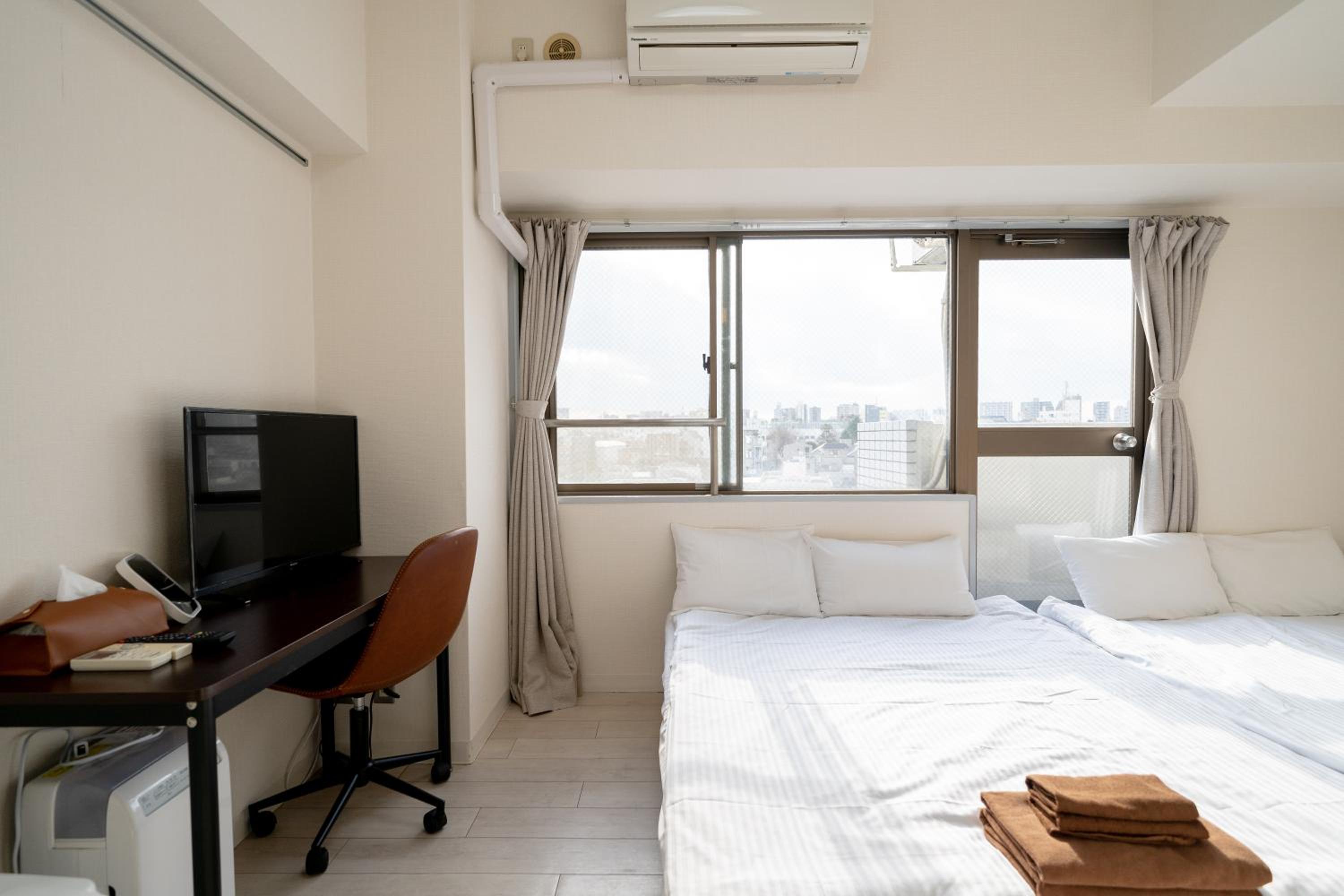 Quadruple Room with Private Bathroom photo 2