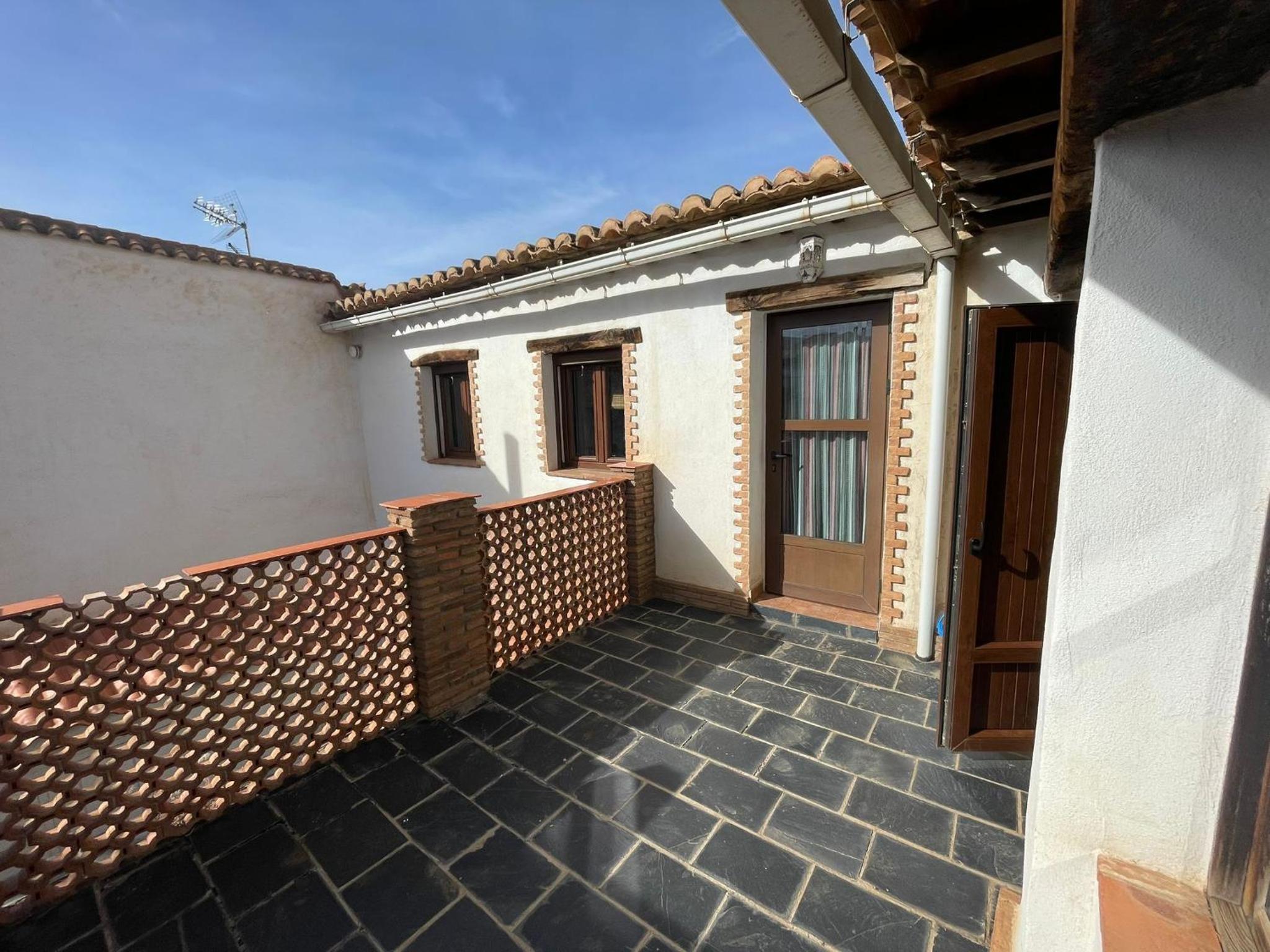 Casa de cuatro habitaciones