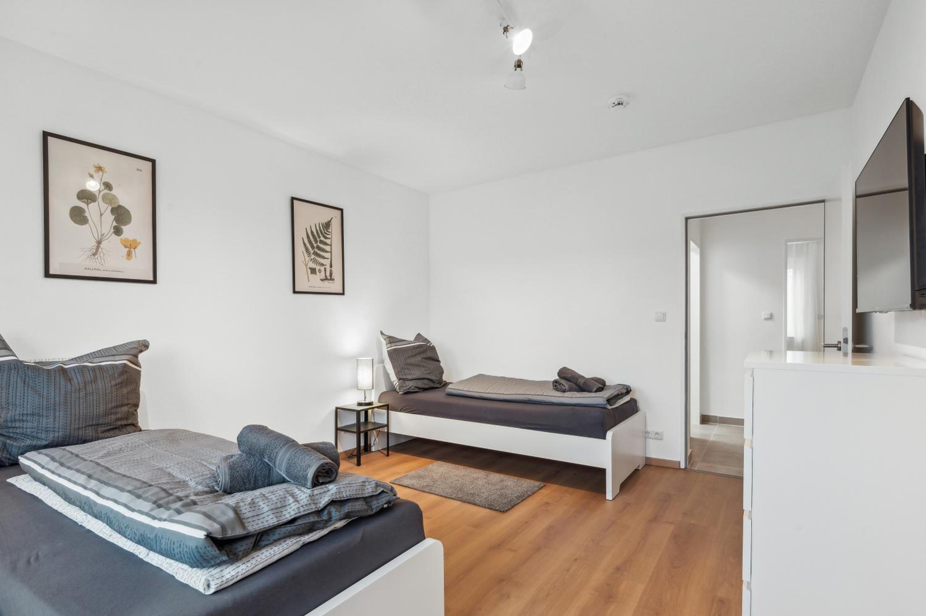 Three-Bedroom Apartment photo 1