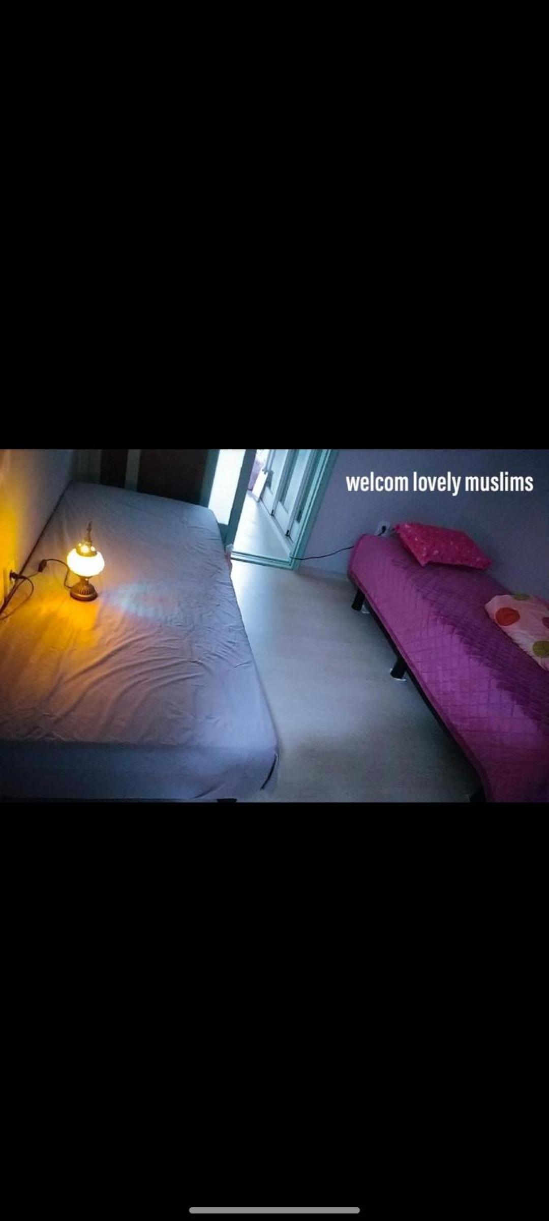 Single Bed In Dormitory Room