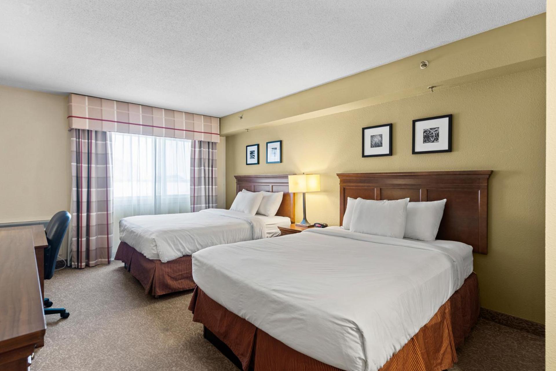 Standard Queen Room with Two Queen Beds - Photo 1