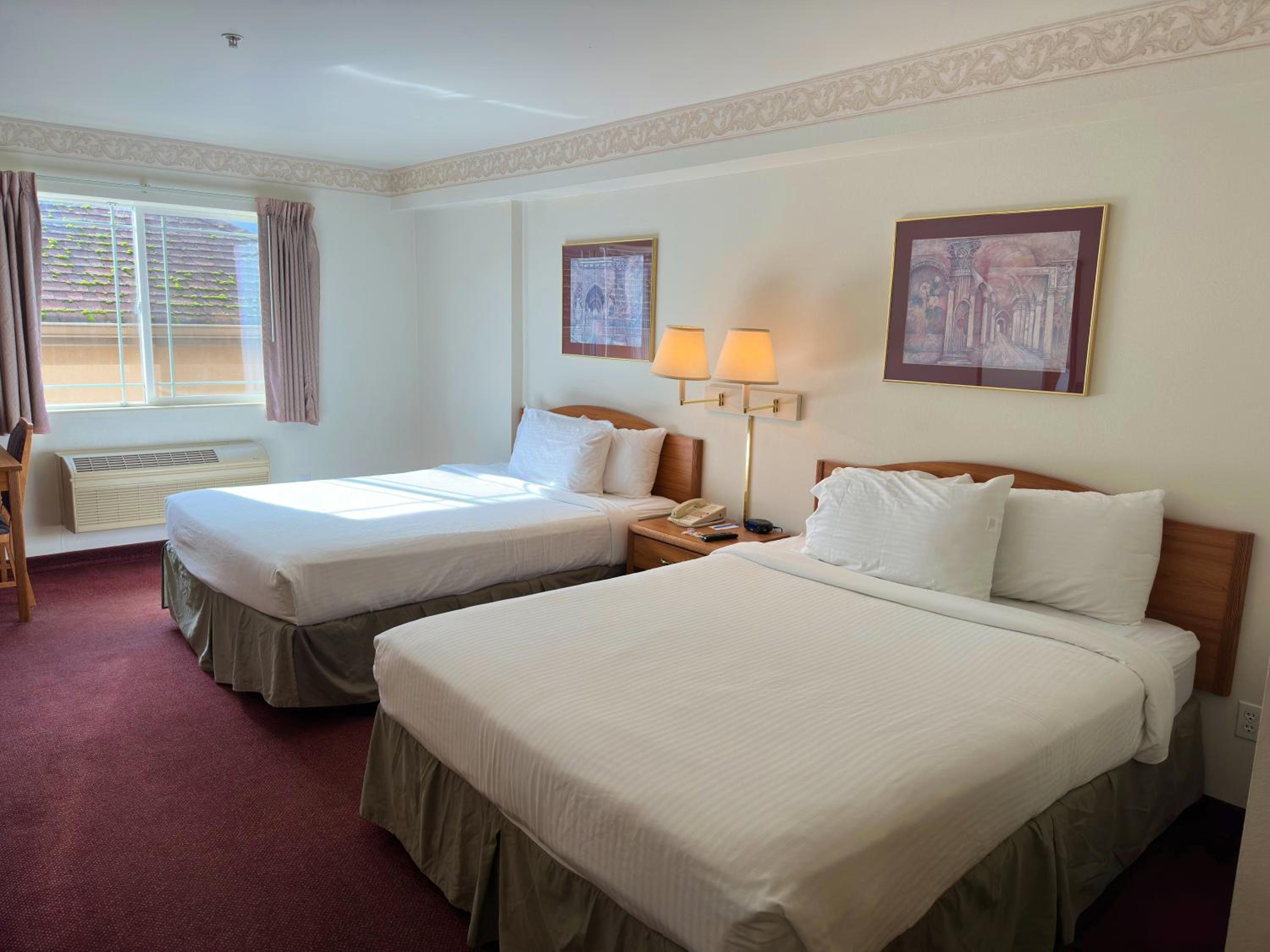 Queen Room with Two Queen Beds - Non-Smoking - Photo 1