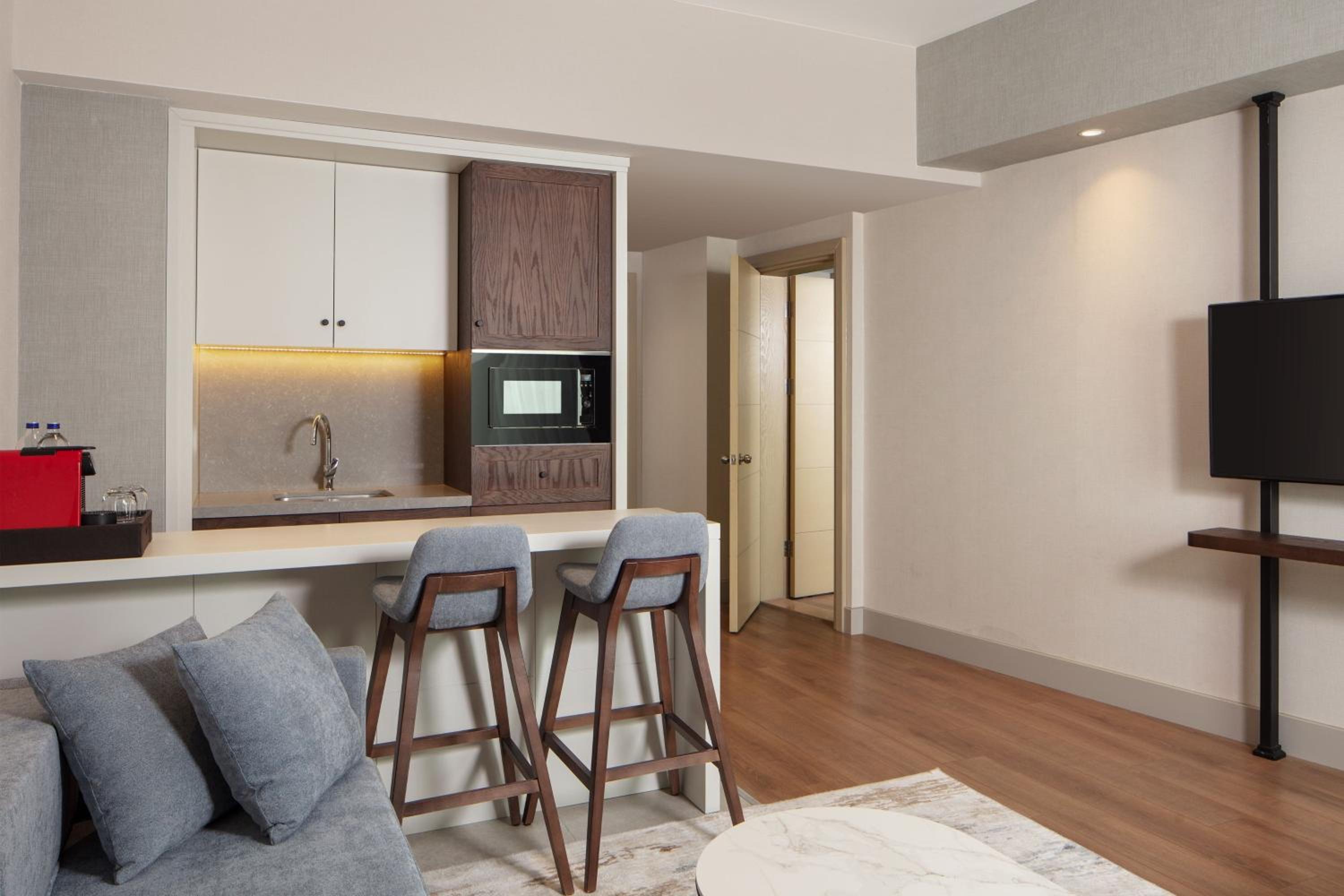 One-Bedroom King Suite with Sofa Bed and Kitchen
