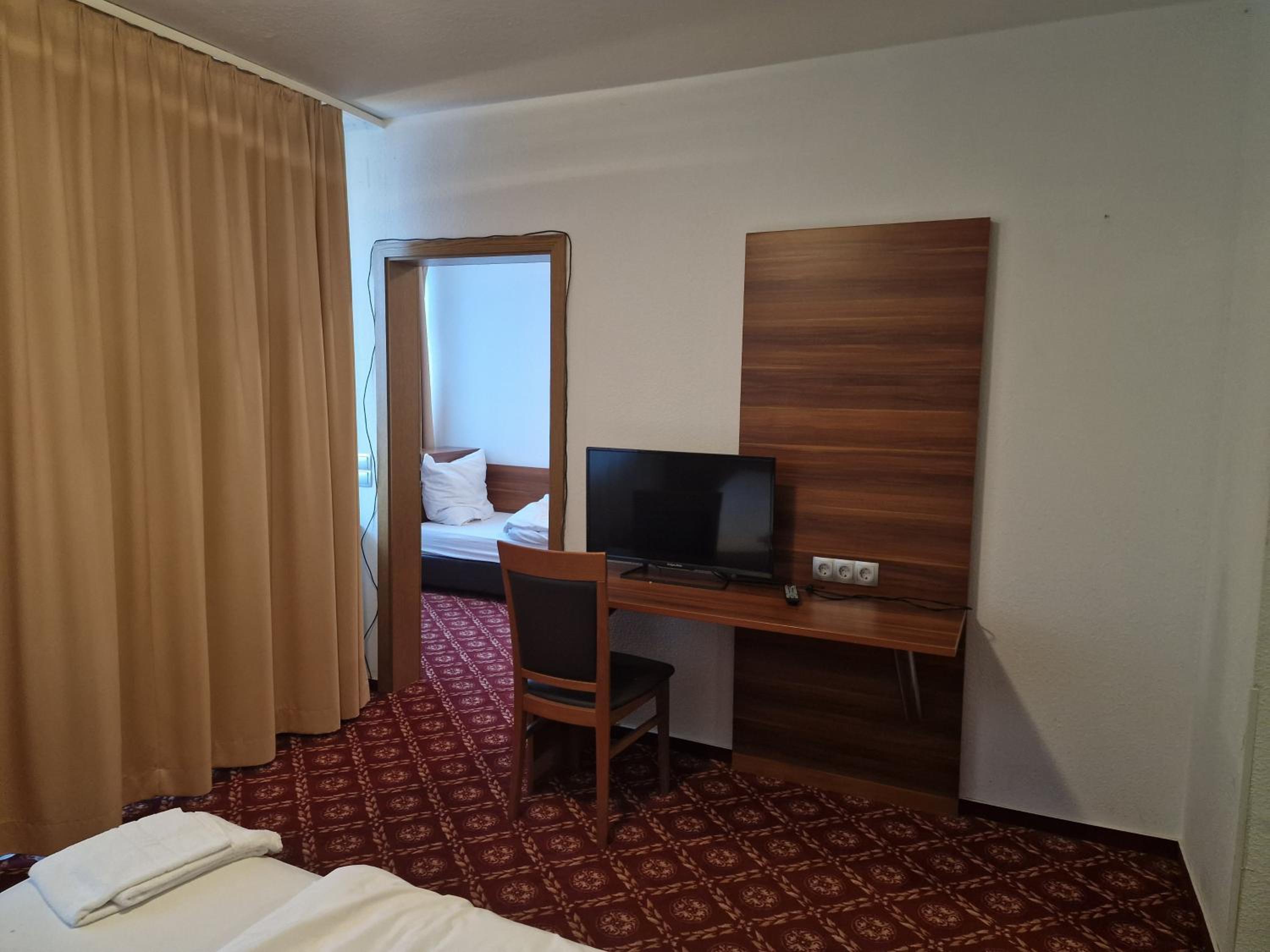Quadruple Room with Balcony photo 3