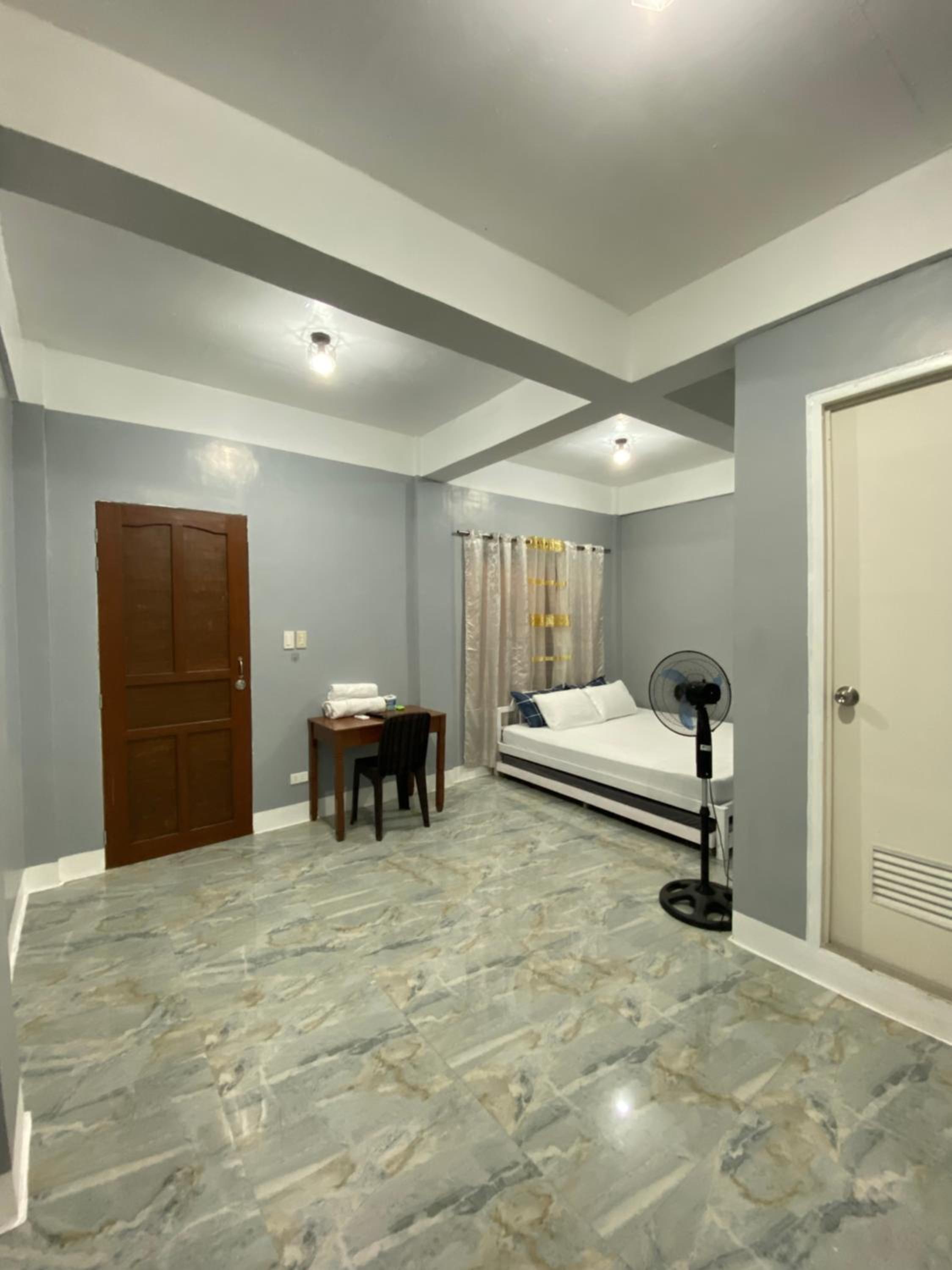Family Room with Balcony - Photo 2