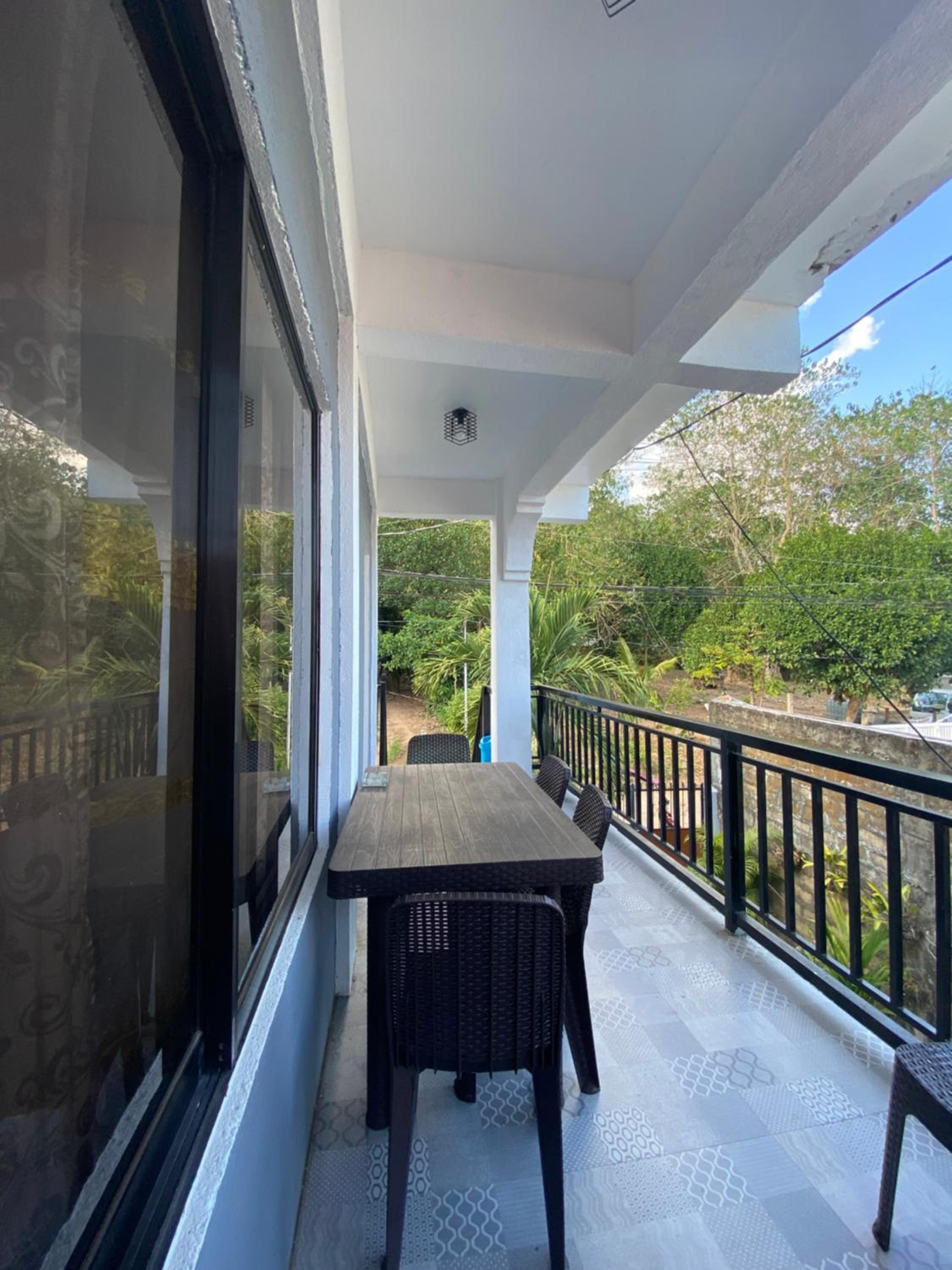 Family Room with Balcony - Photo 4