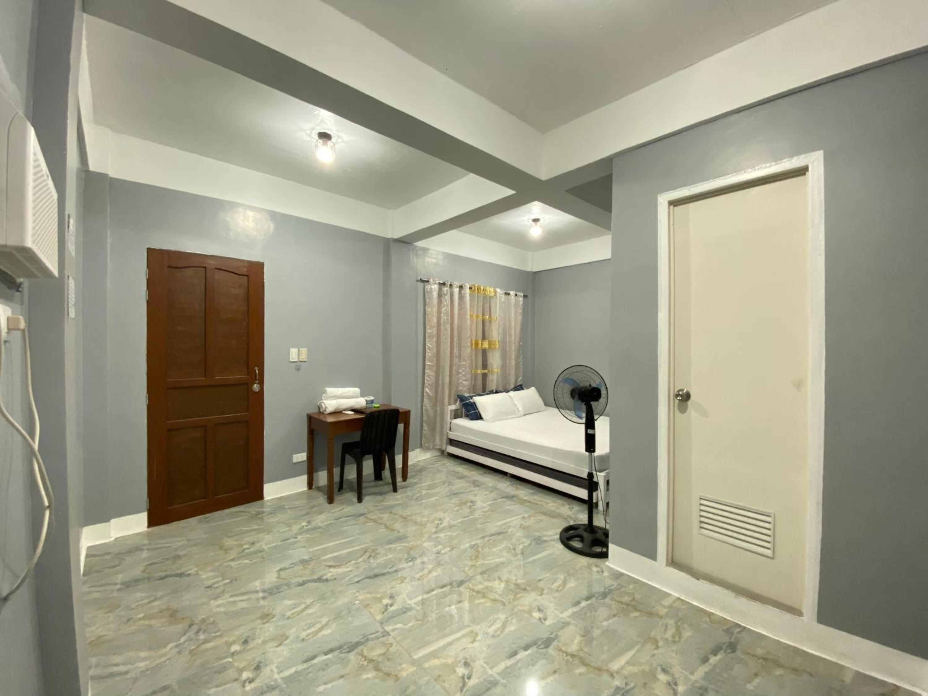 Family Room with Balcony - Photo 3