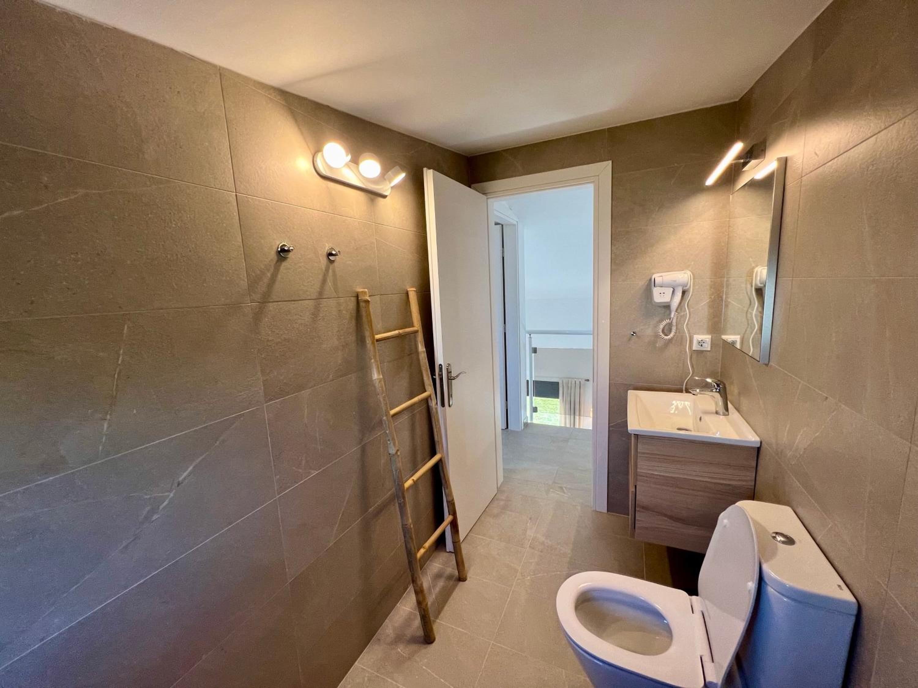 Three-Bedroom House photo 2