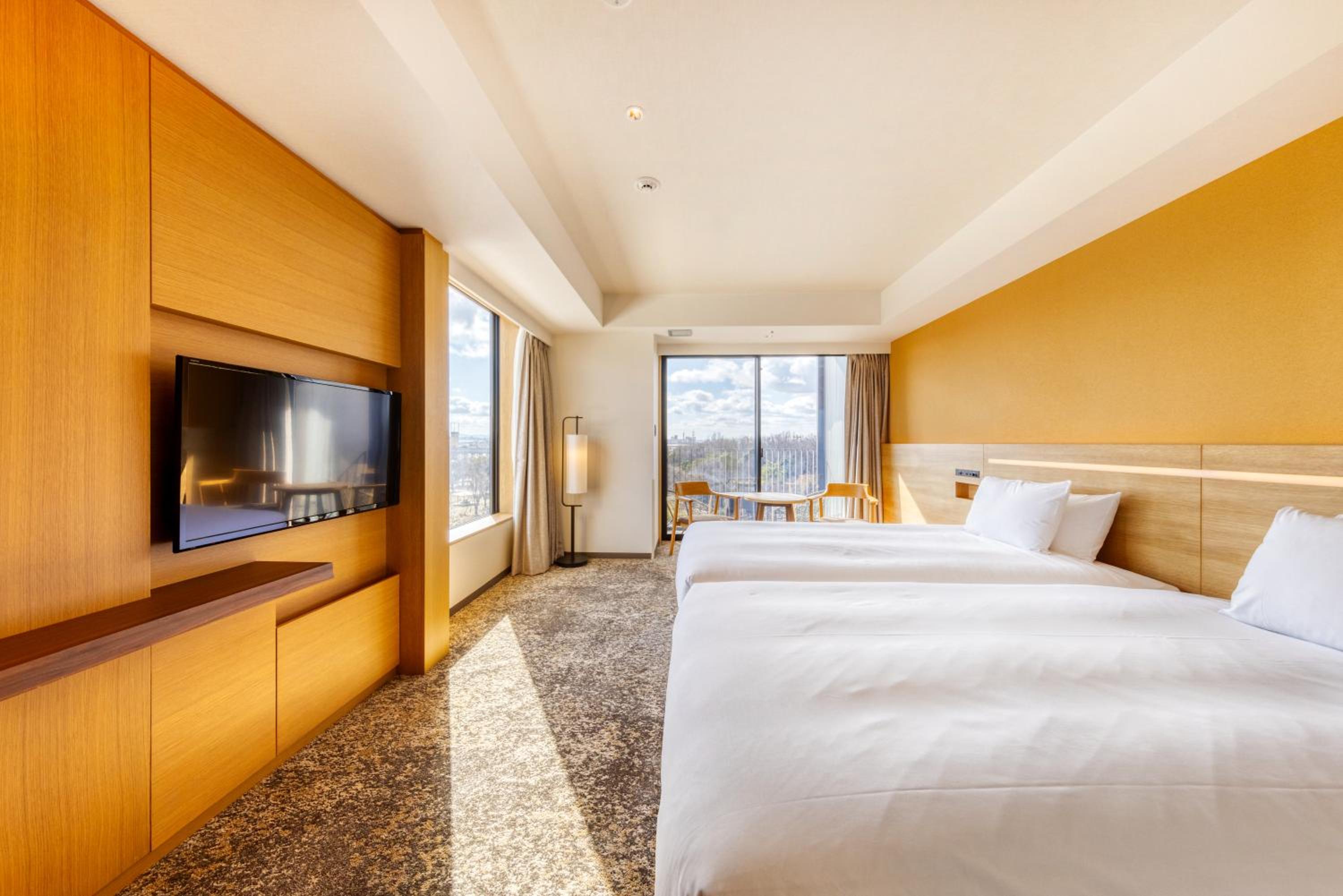 Corner Twin Room with Bathroom, Balcony and Garden View - Non Smoking - Photo 1