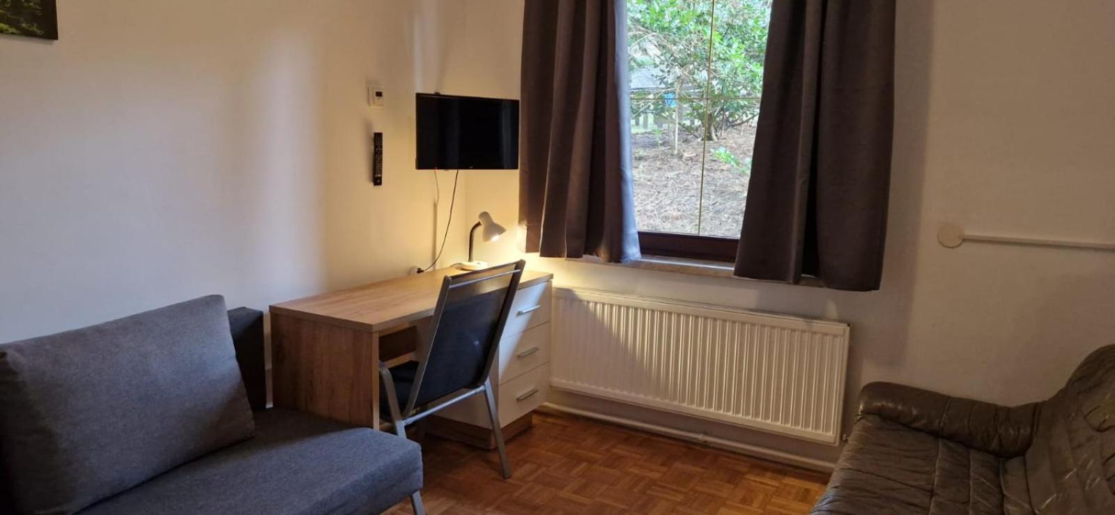Three-Bedroom Apartment photo 1