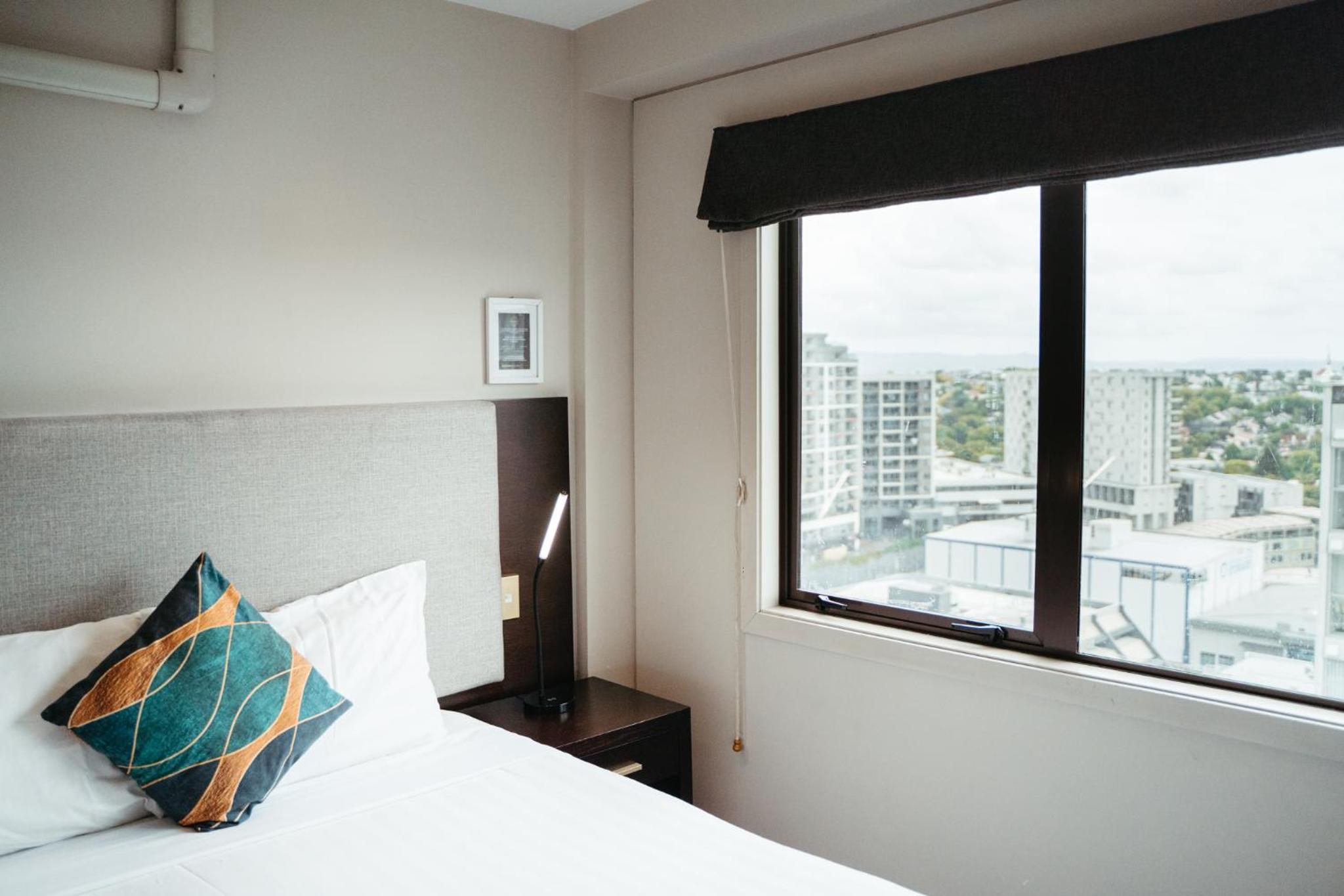 Two-Bedroom Apartment - Split Level with Queen and Single - Photo 1