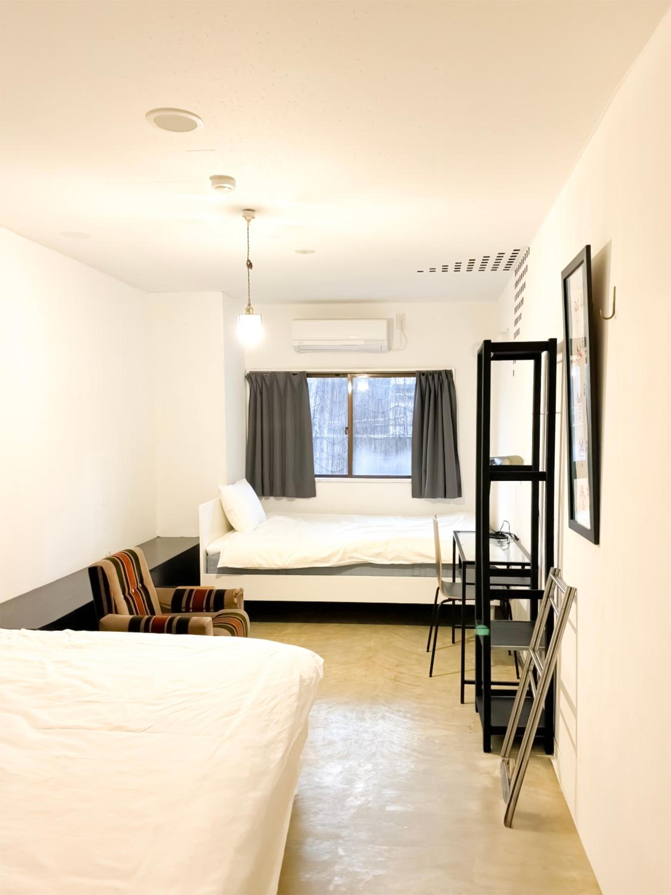 Twin Room with Shared Bathroom photo 1