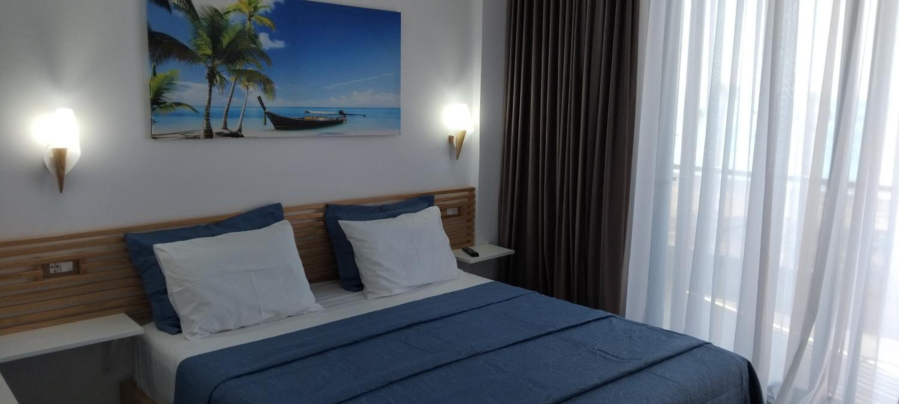 Deluxe Triple Room with Sea View photo 2