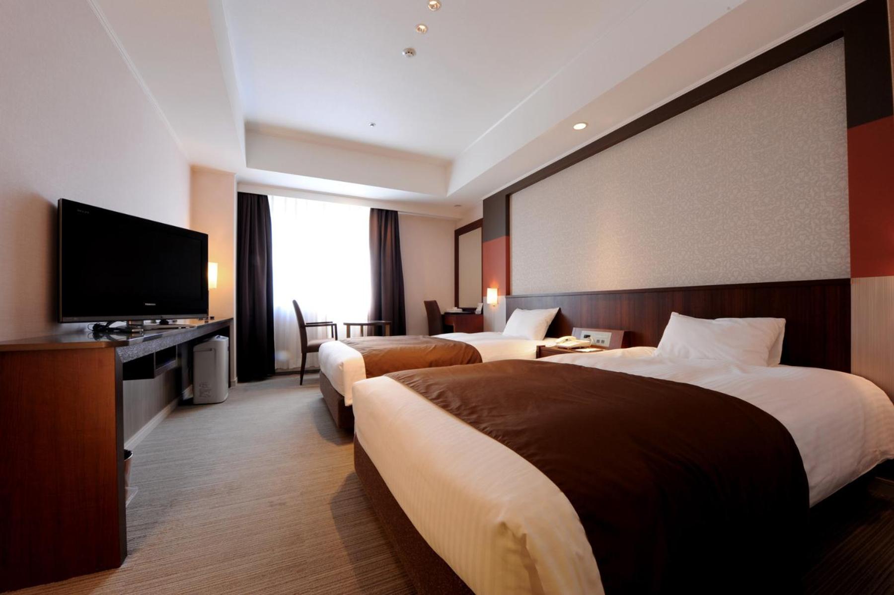 Twin Room - Non-Smoking - Photo 6