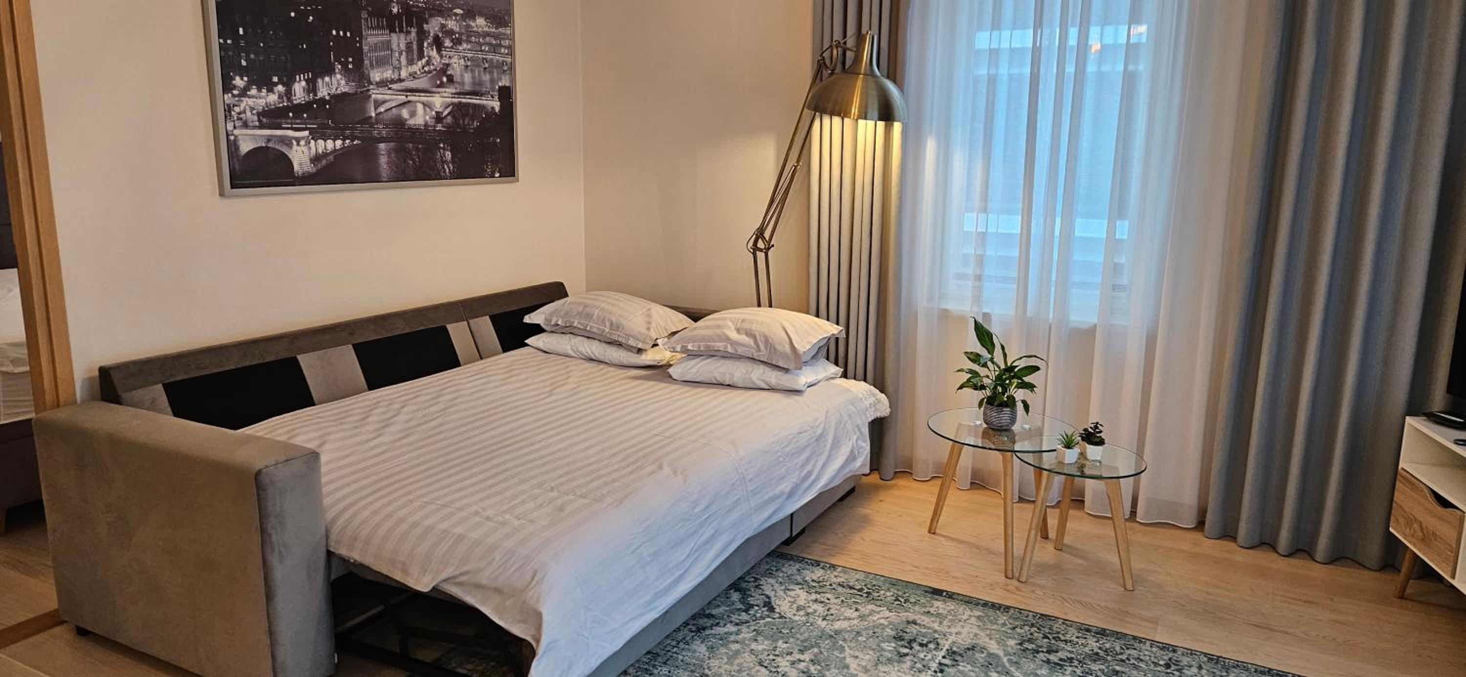 Apartment with Balcony - Photo 18