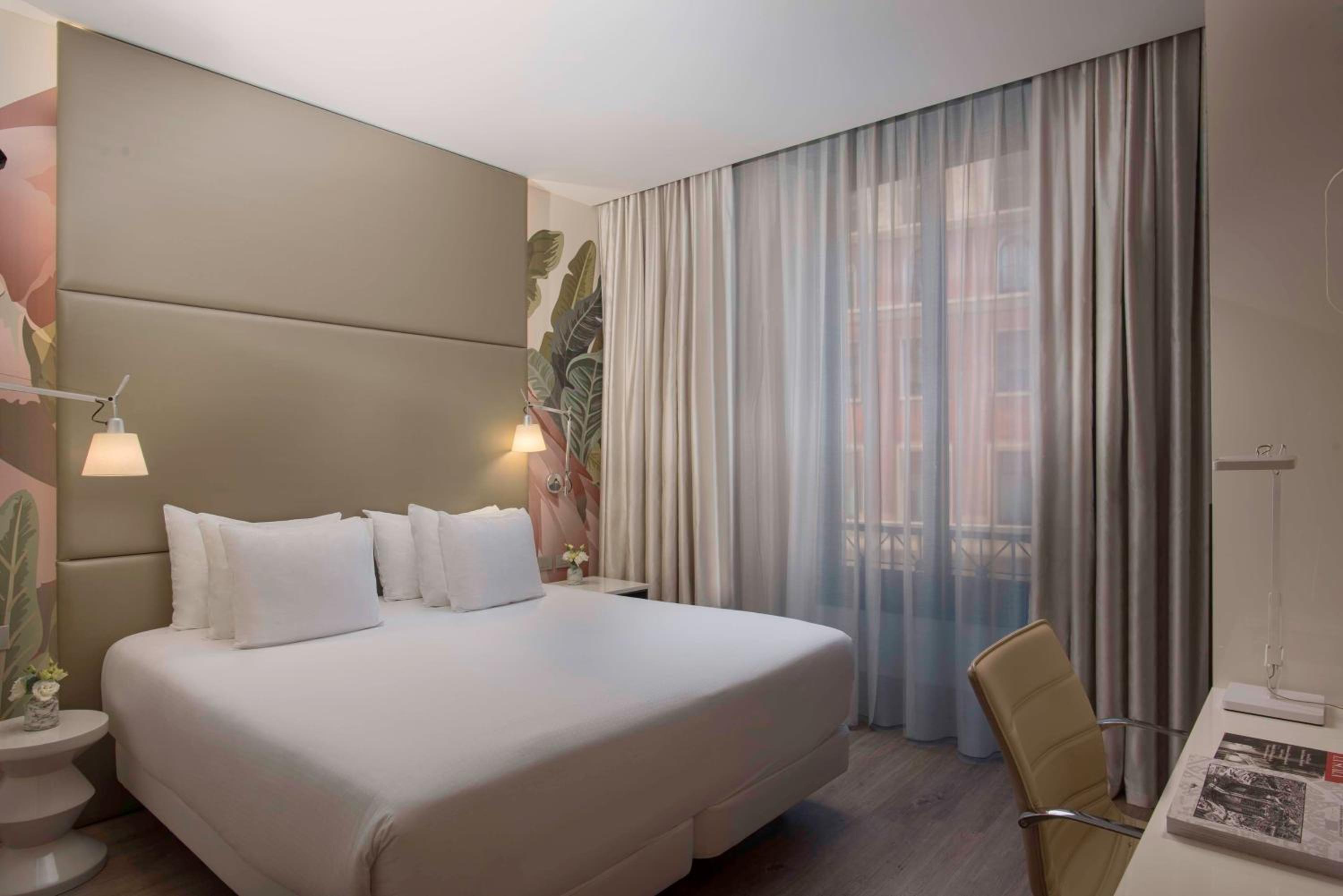 Family Adjoining Room (3 Adults + 1 Child)