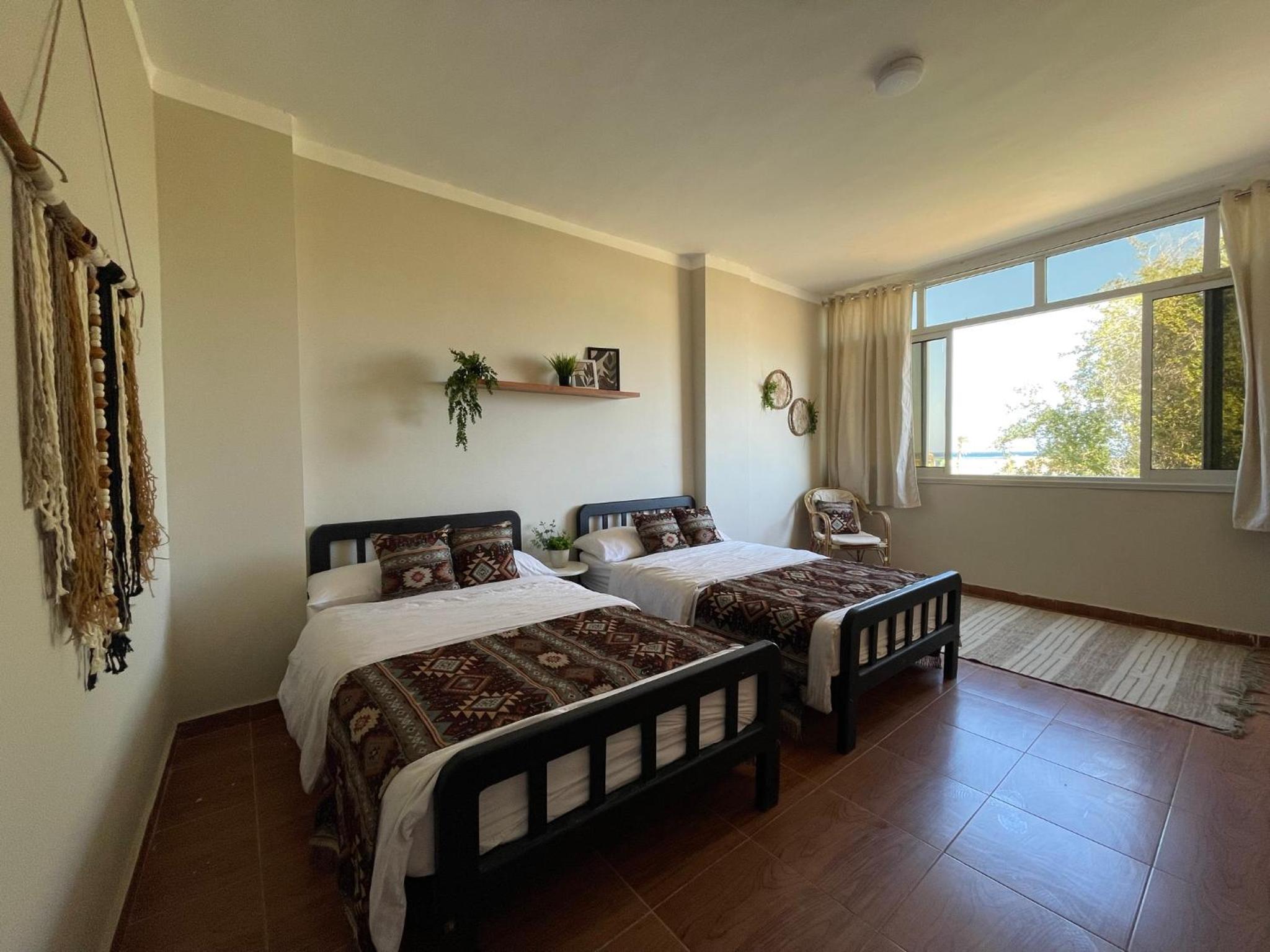 Quarto Duplo com Banheiro Compartilhado
