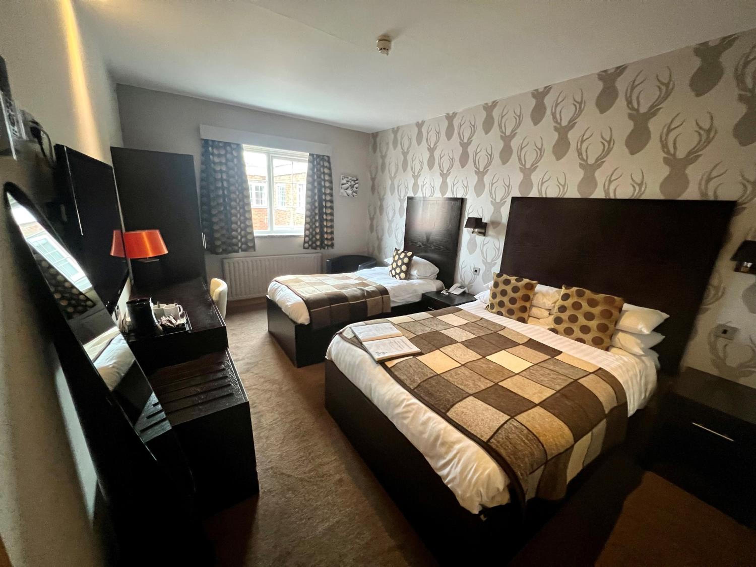 Deluxe Triple Room - Photo 1