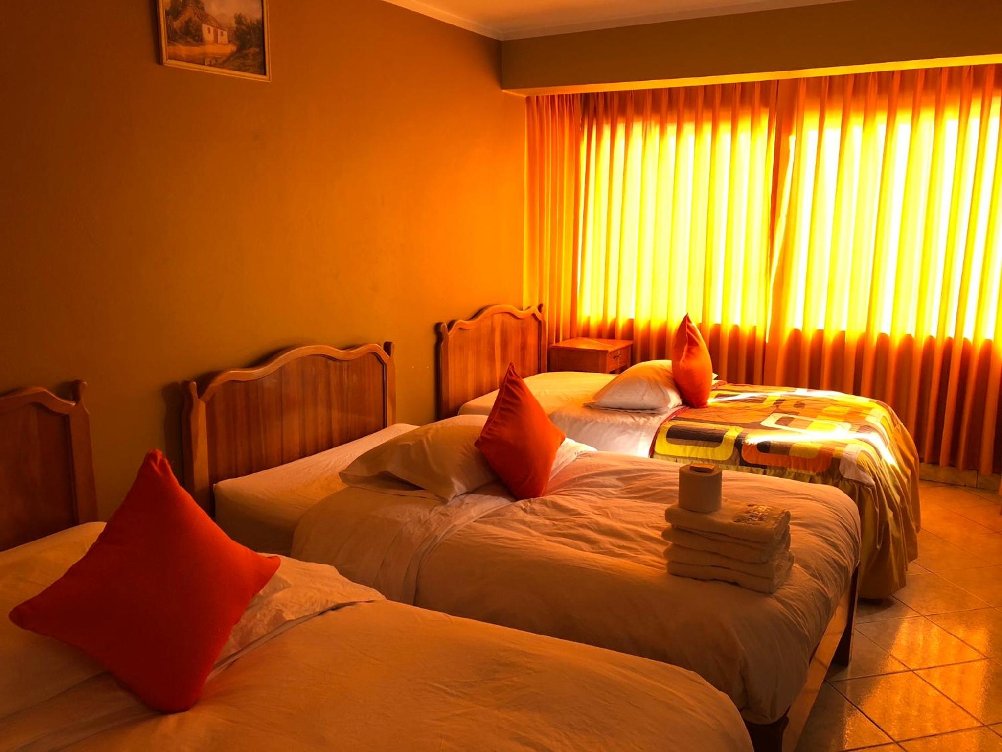 Quadruple Room with Private Bathroom photo 1