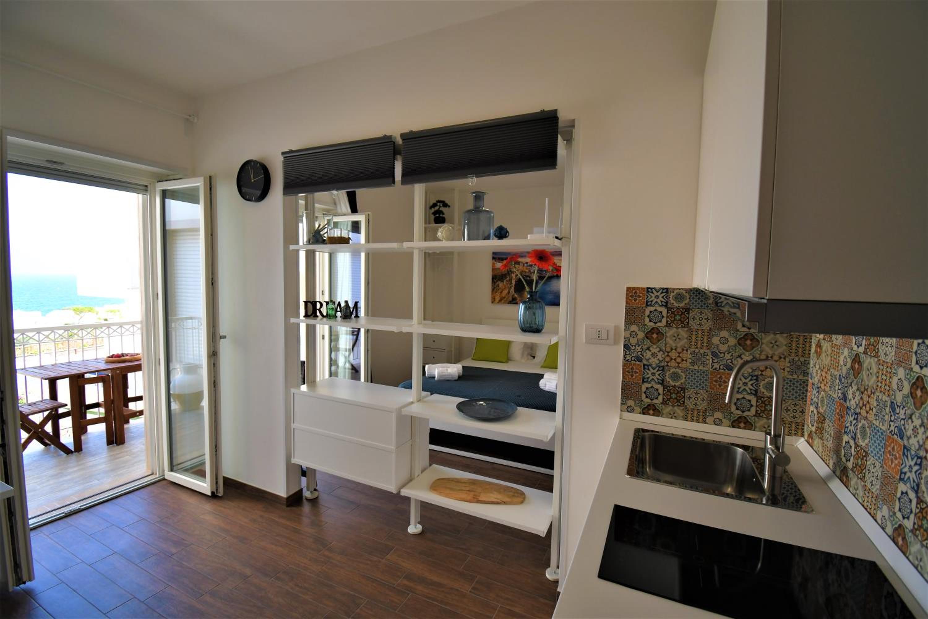 One-Bedroom Apartment with Balcony and Sea View