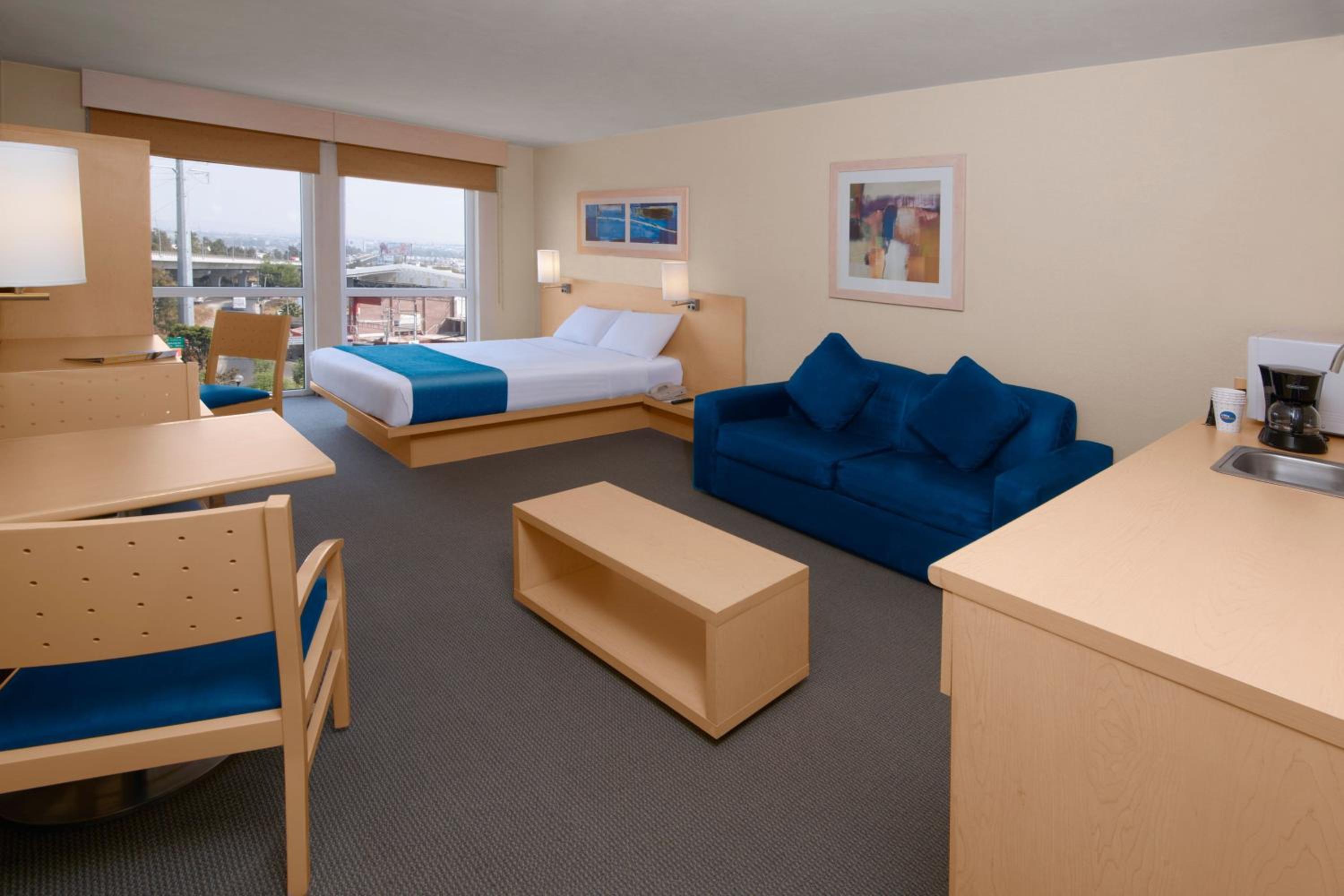 Queen Suite with Sofa Bed photo 2