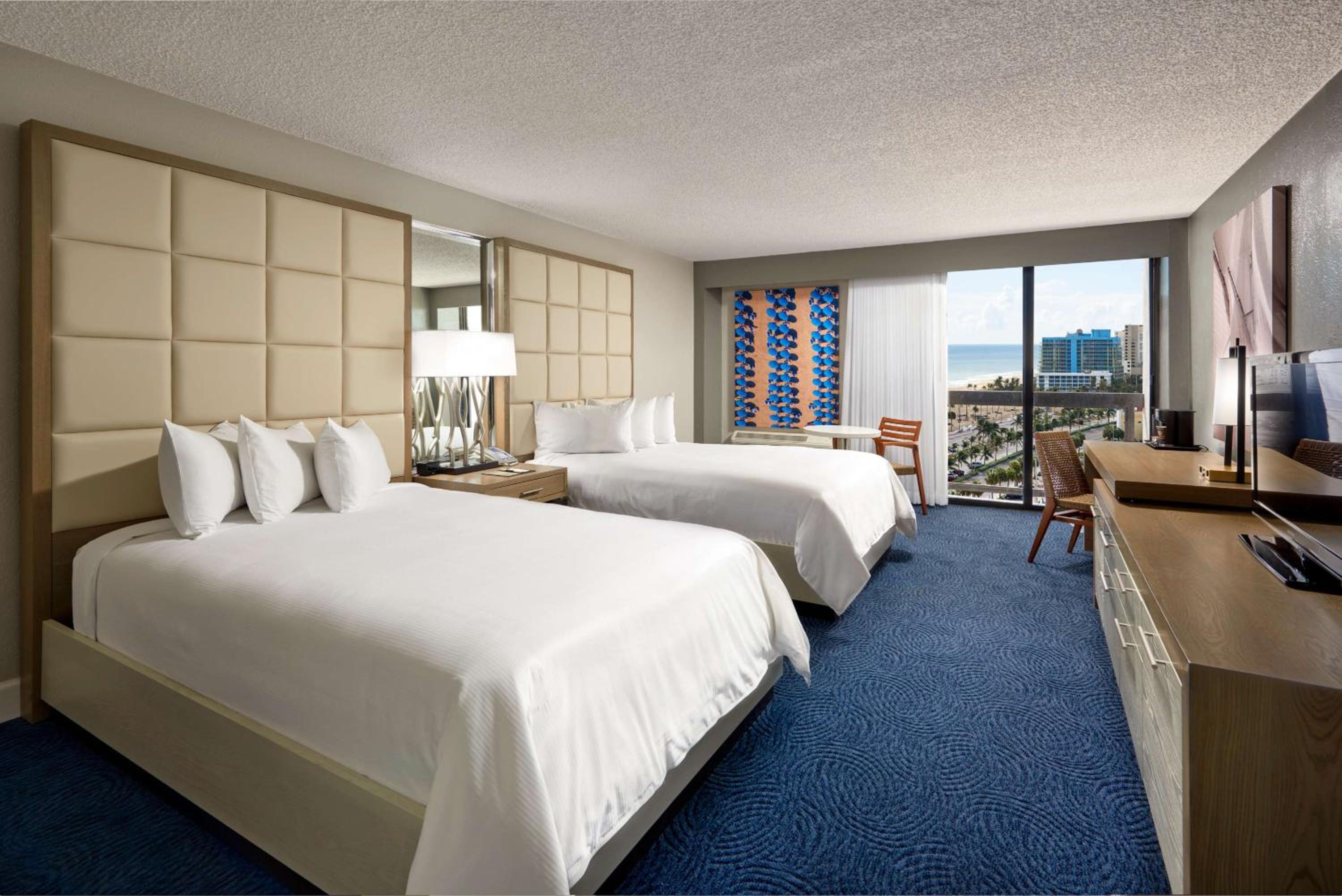 Double Room with Two Double Beds and Partial Ocean View - Photo 1