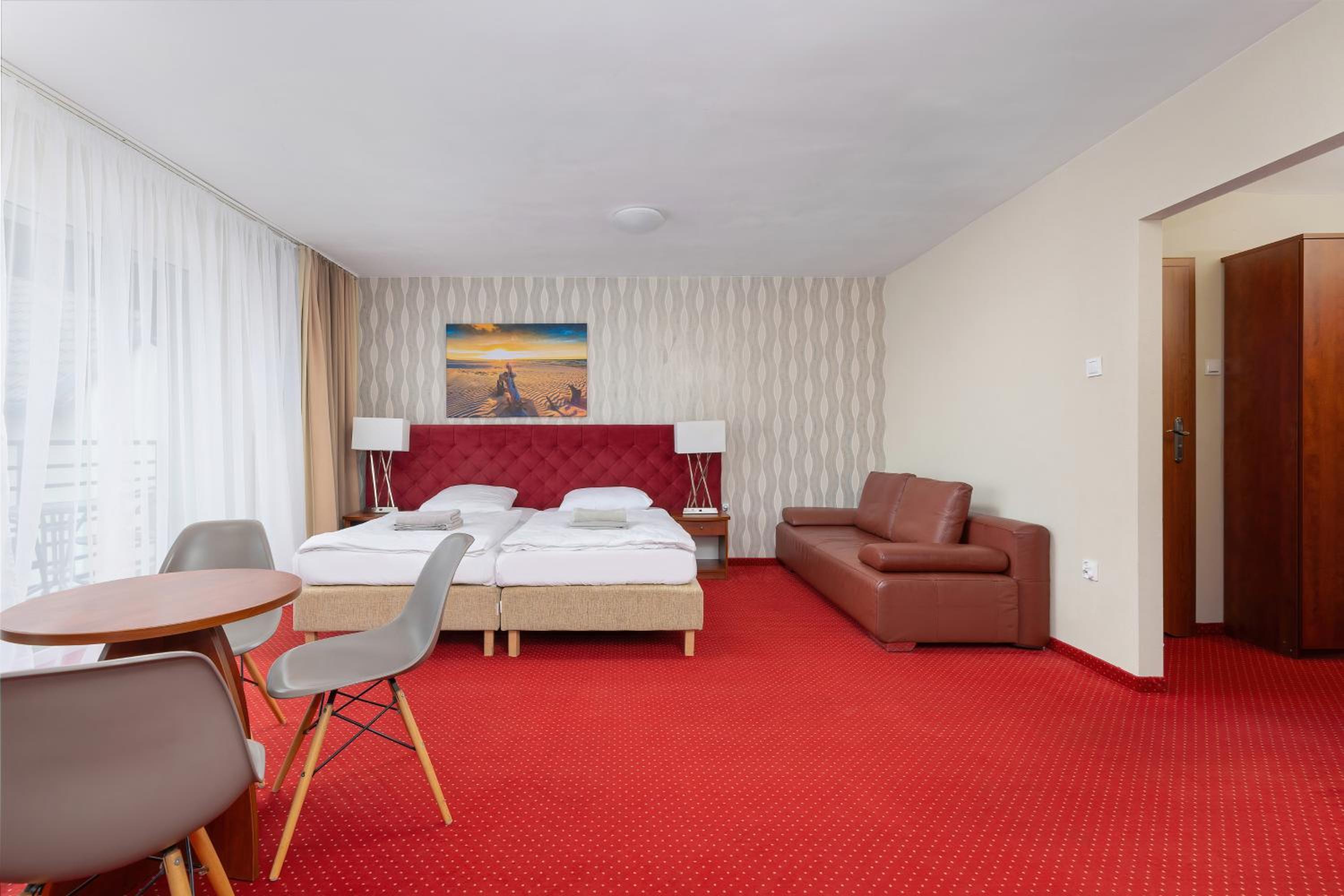 Quadruple Room with Balcony - Photo 1