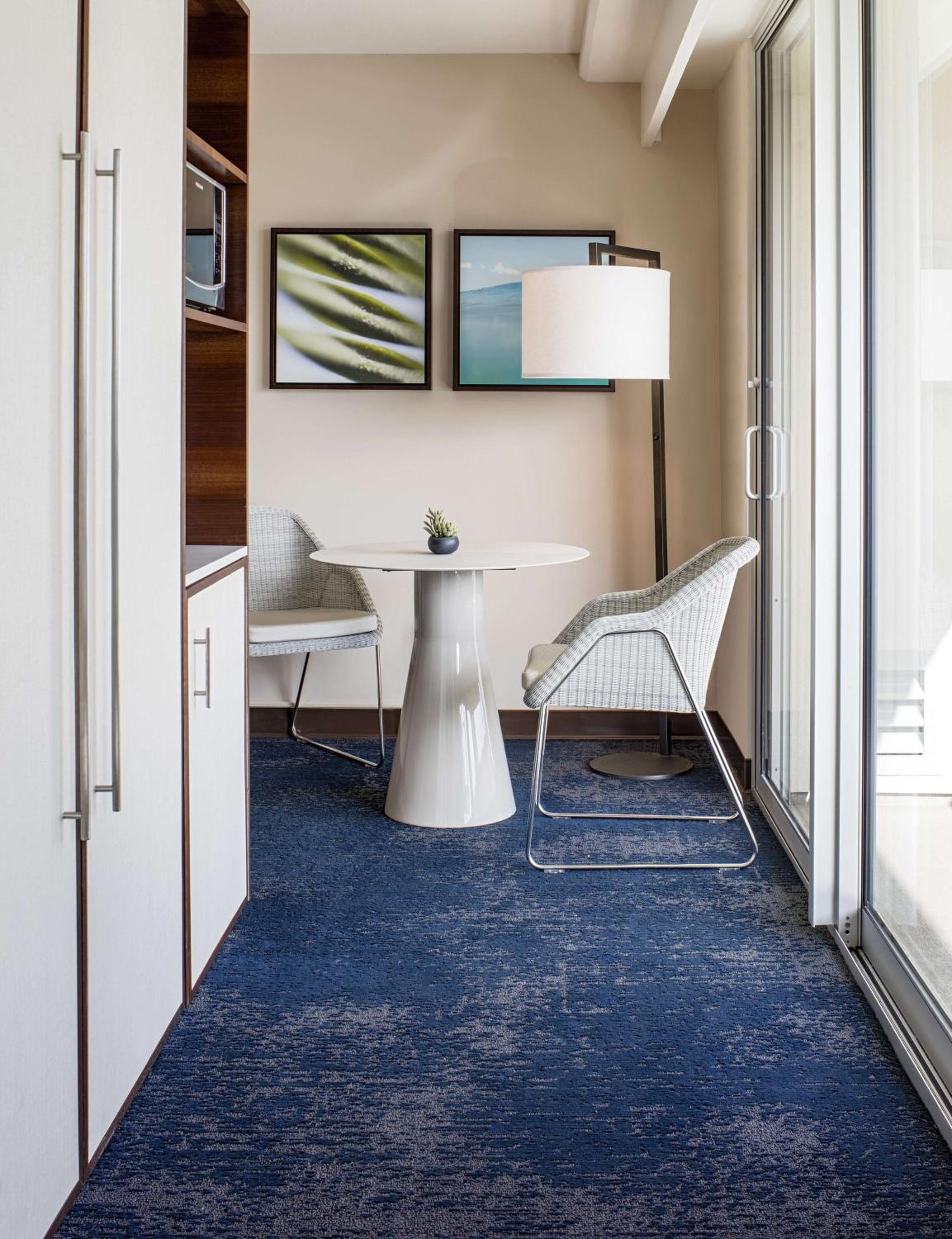 Suite with Two Double Beds and One Sofa Bed with Partial Ocean View