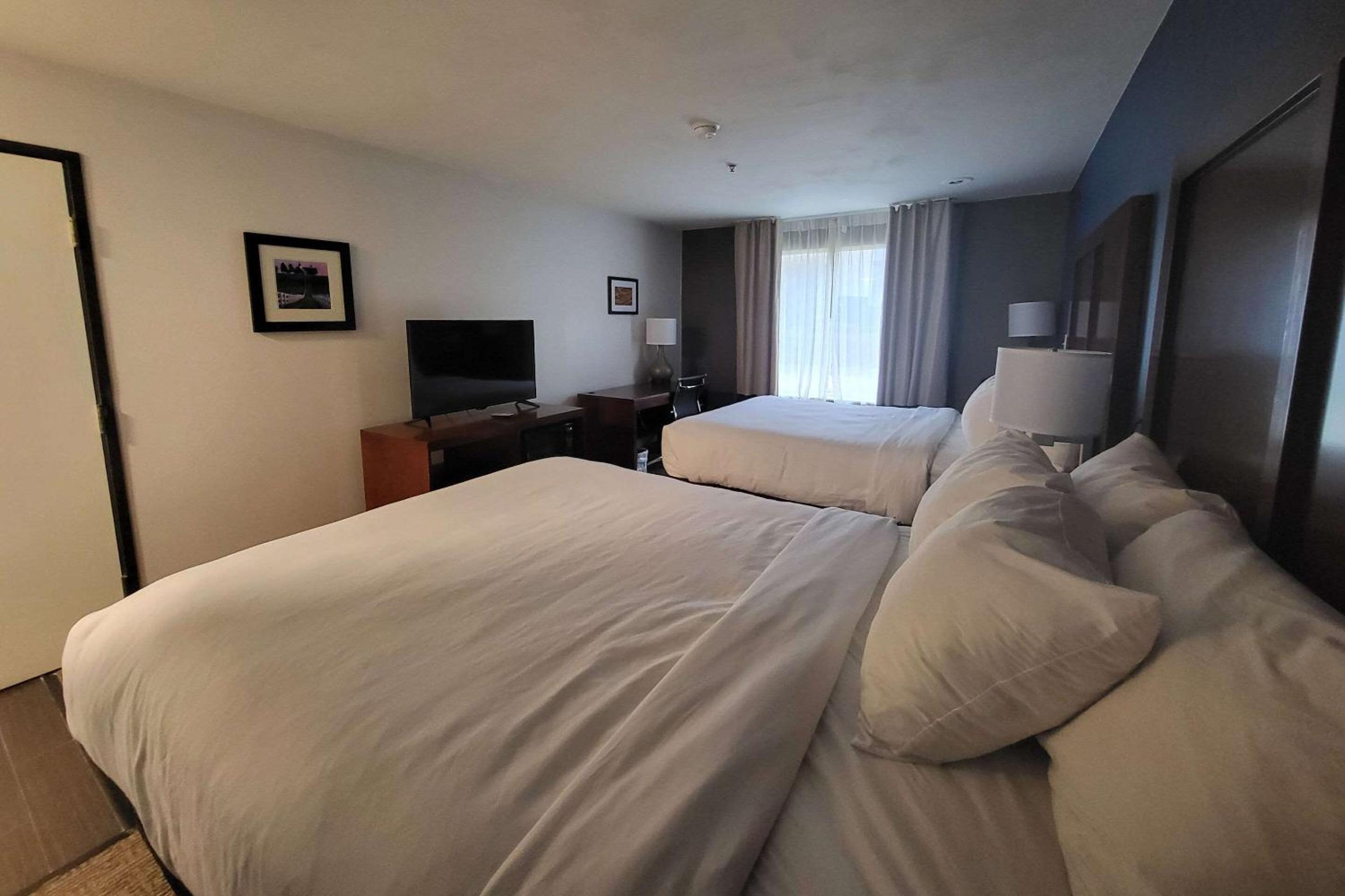Queen Room with Two Queen Beds - Photo 1