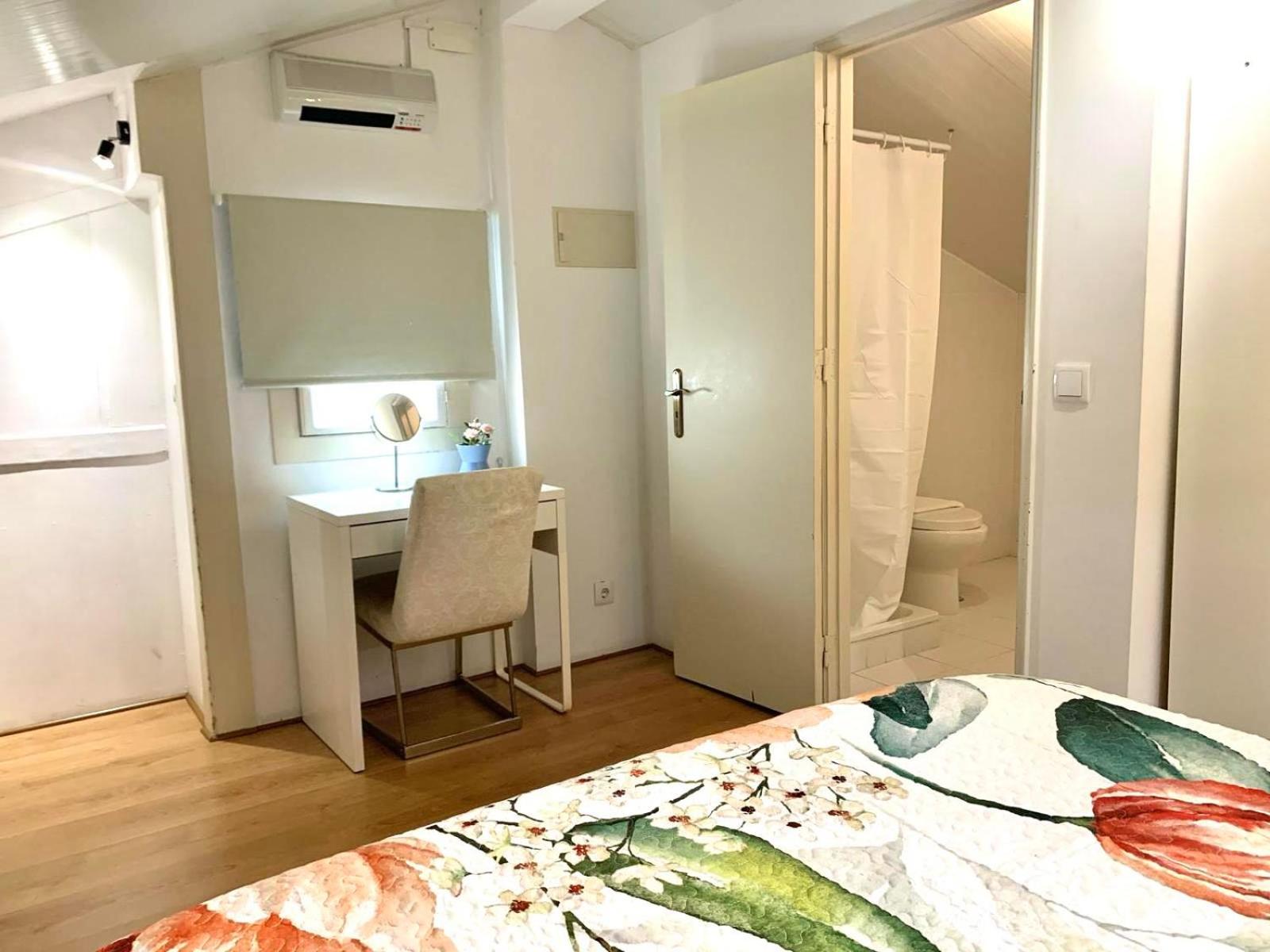 Three-Bedroom Apartment - Photo 12