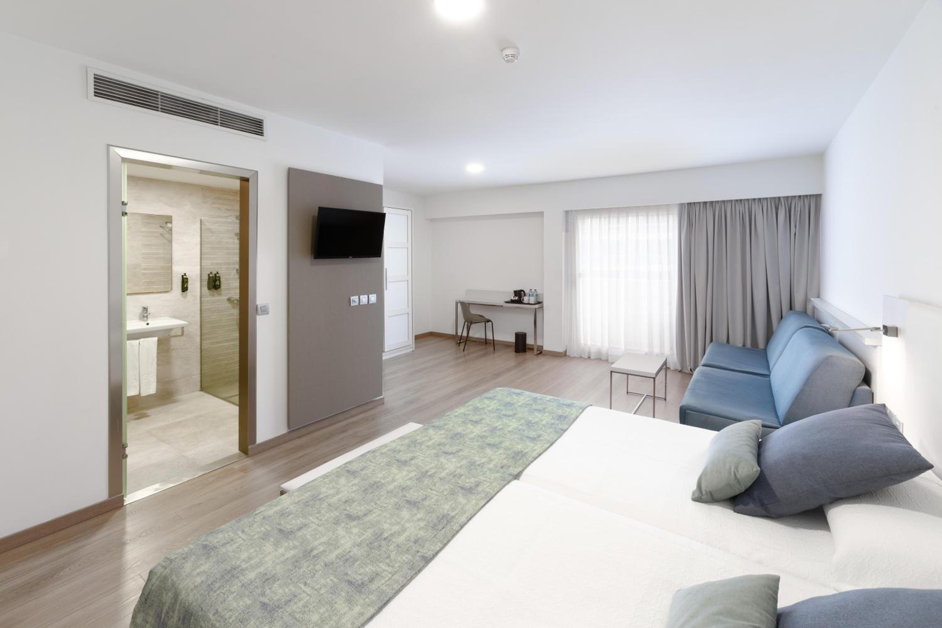 Habitación Familiar (2 Adultos + 2 Niños)