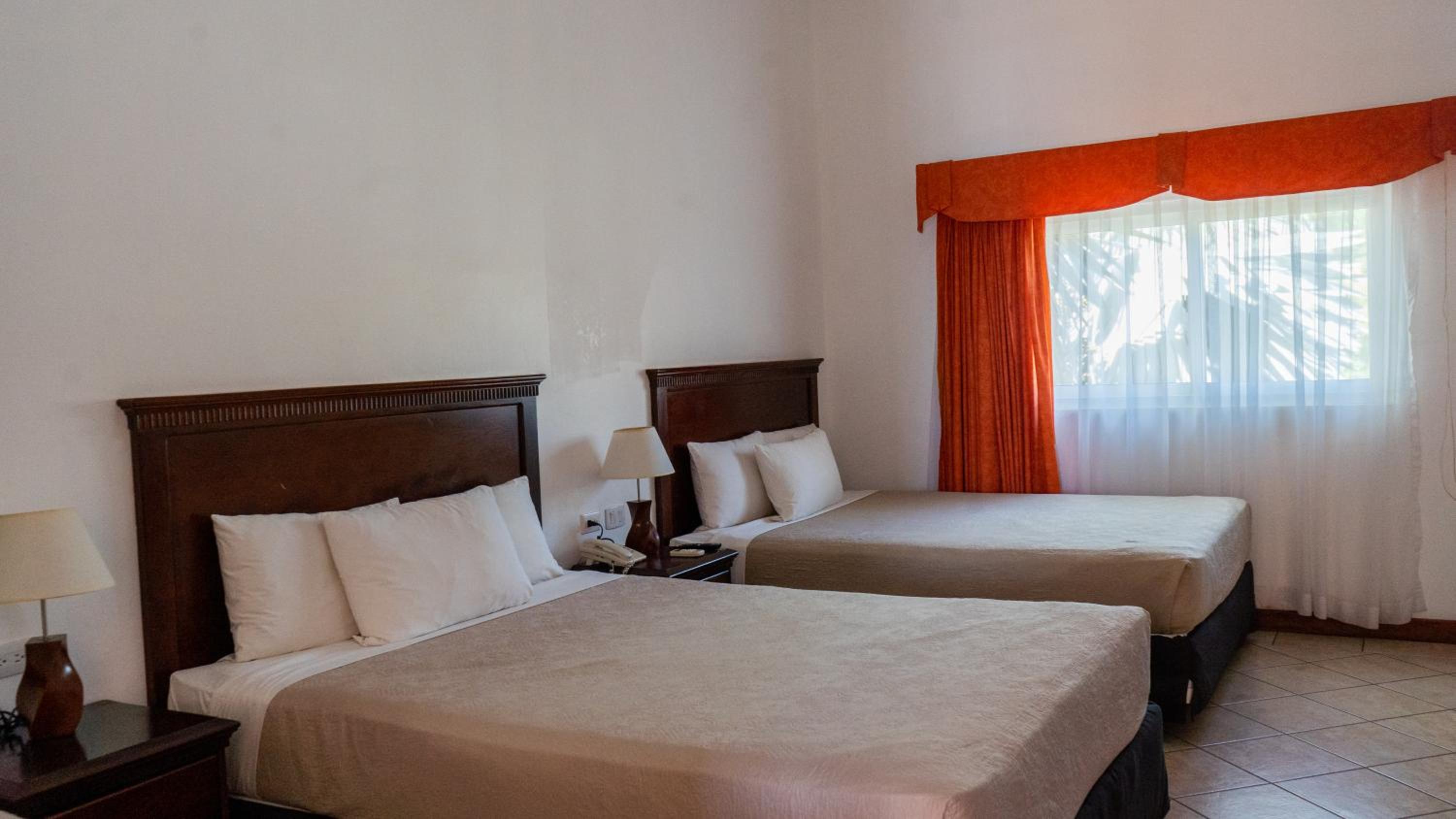 Deluxe Queen Room with Two Queen Beds photo 1