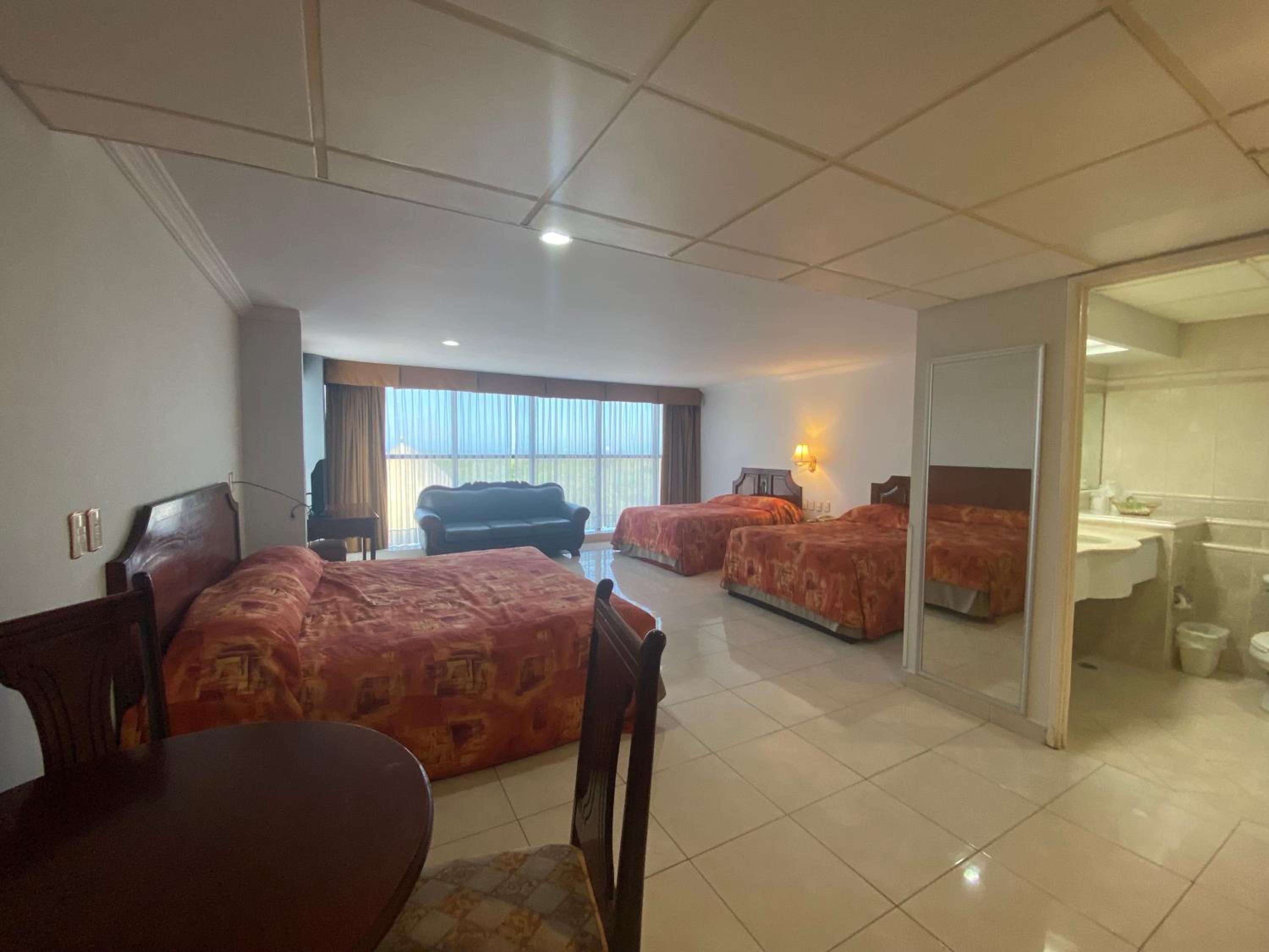 Triple Room - Photo 1