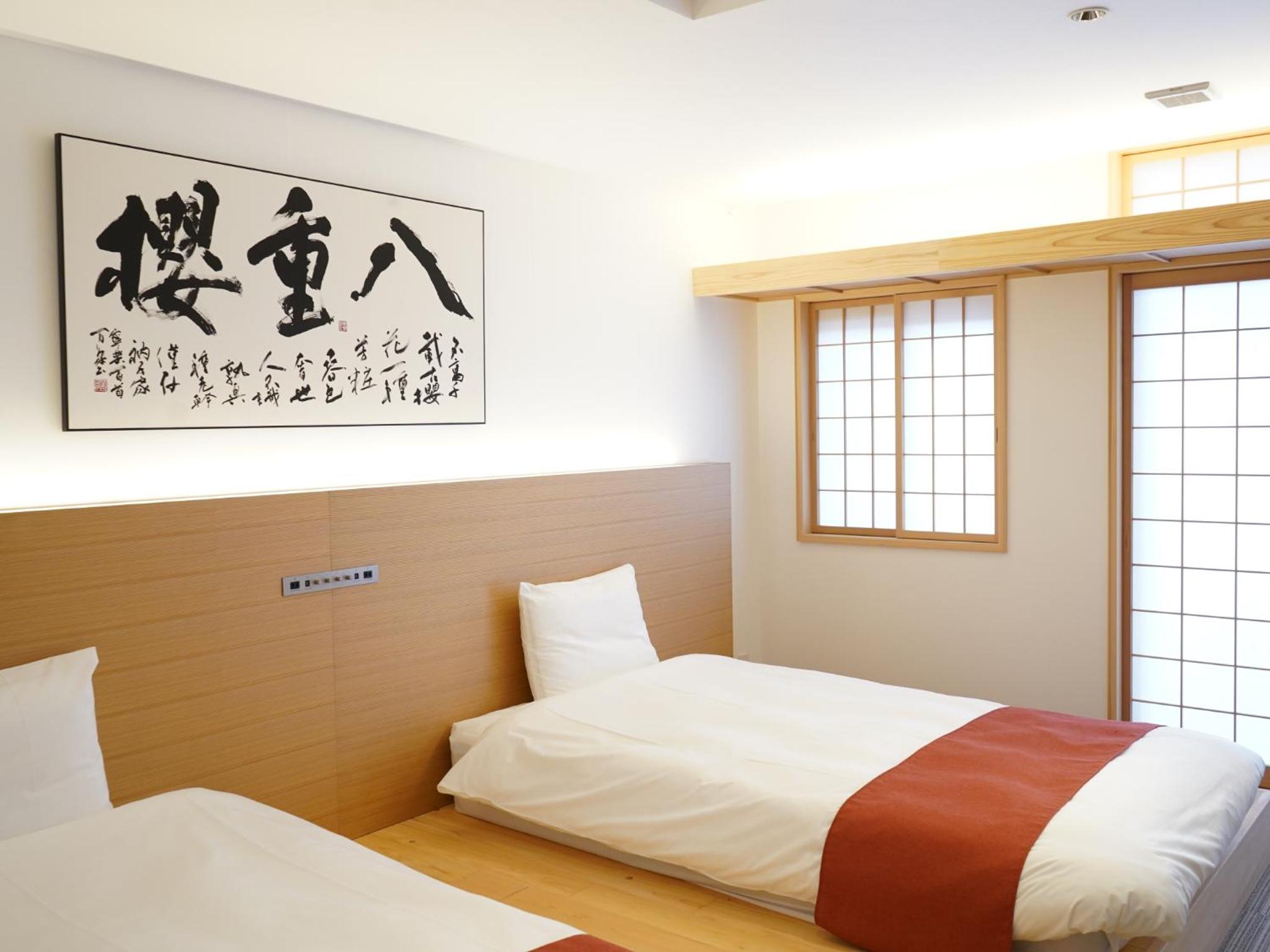 Twin Room with Balcony - Photo 1
