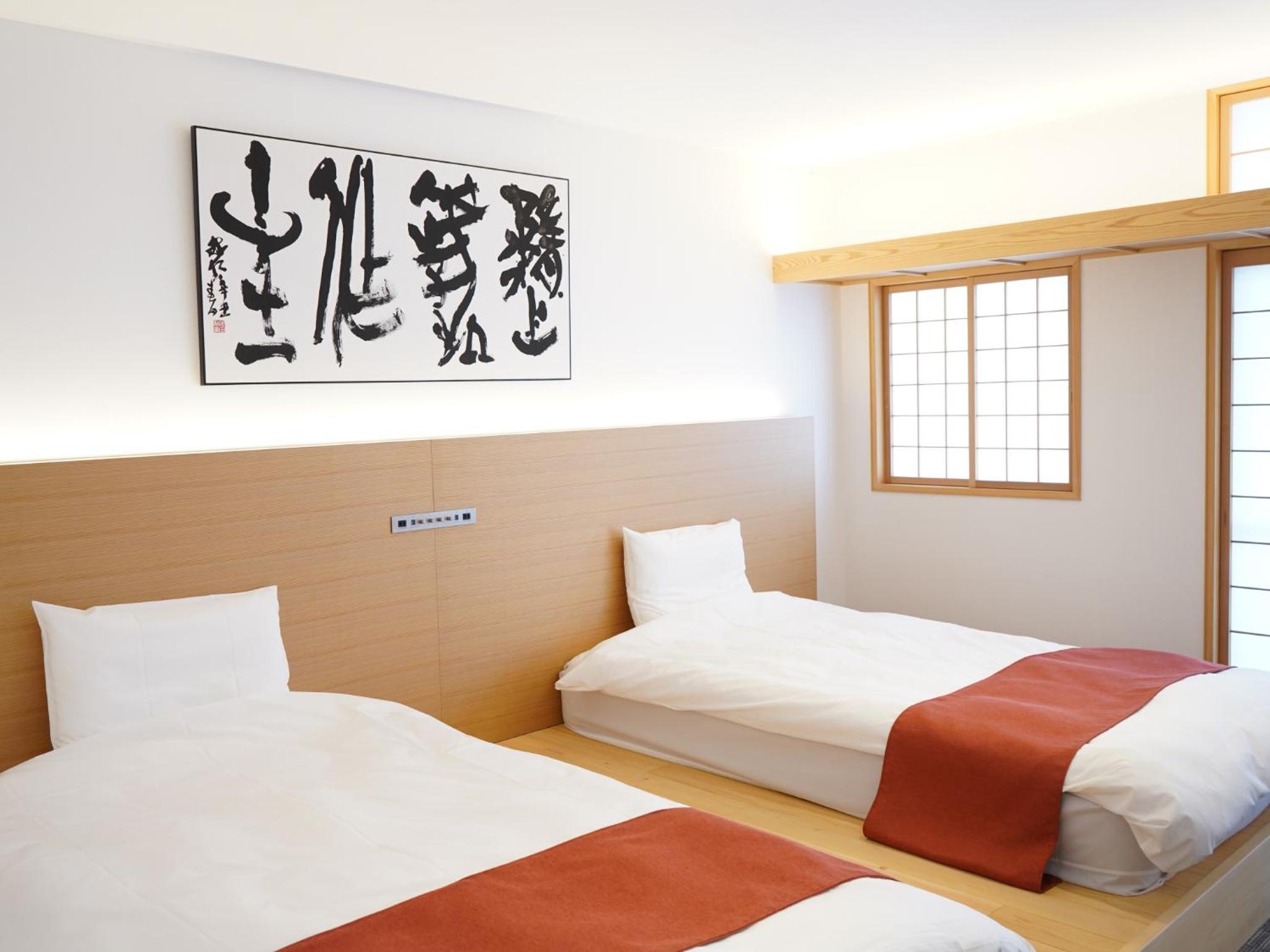 Twin Room - Photo 13