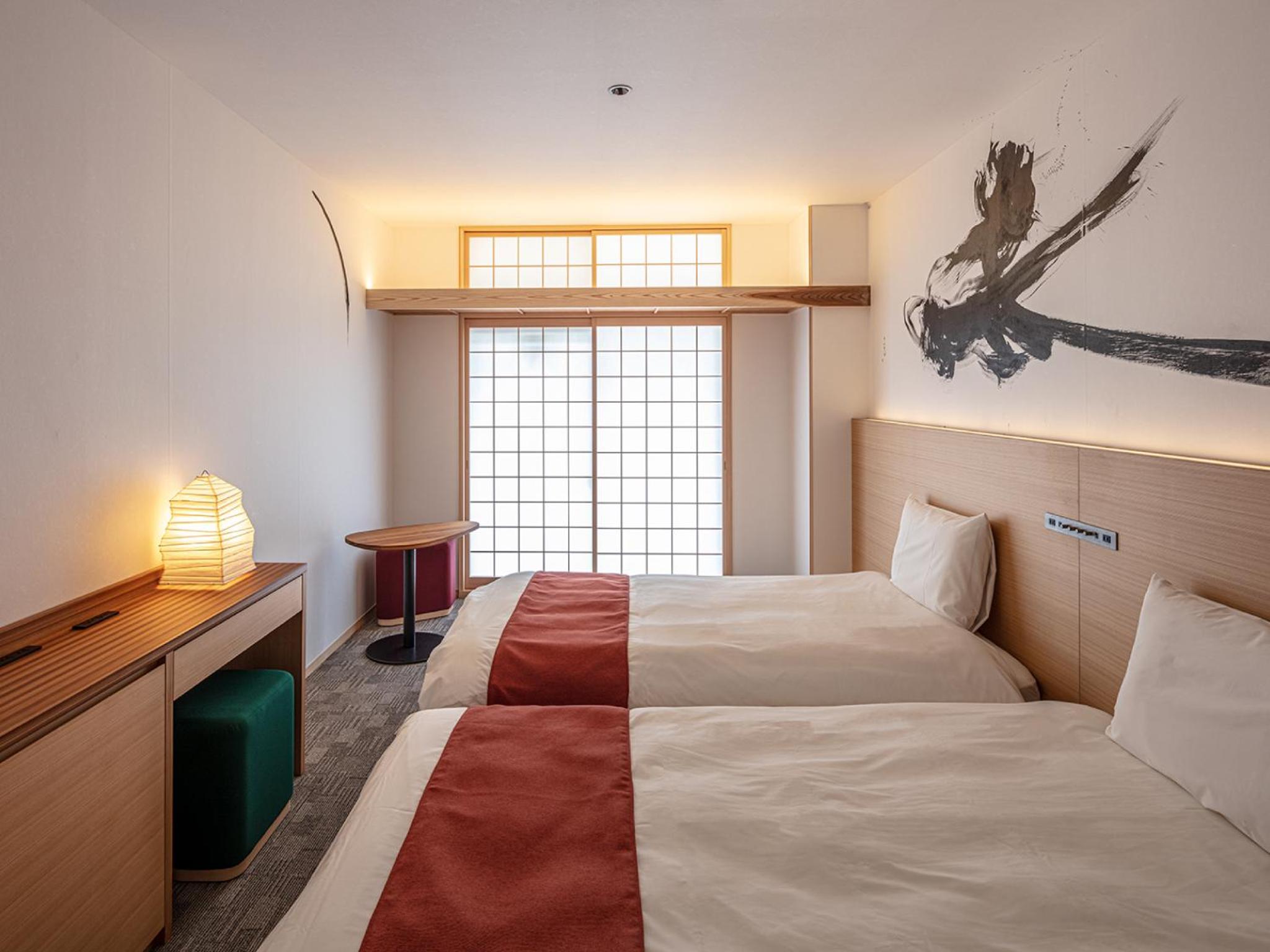 Twin Room - Photo 10