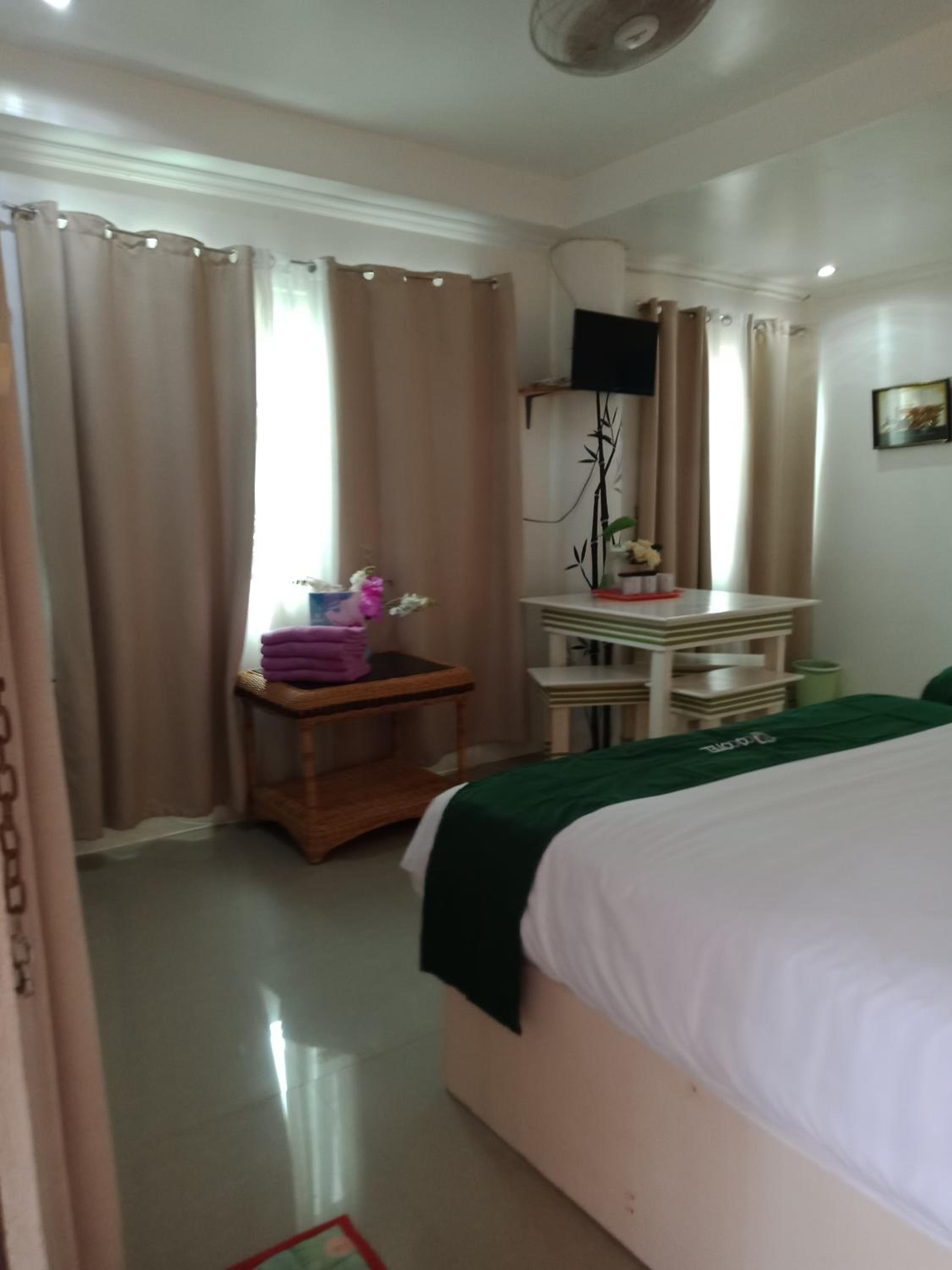 Deluxe Quadruple Room - Photo 11