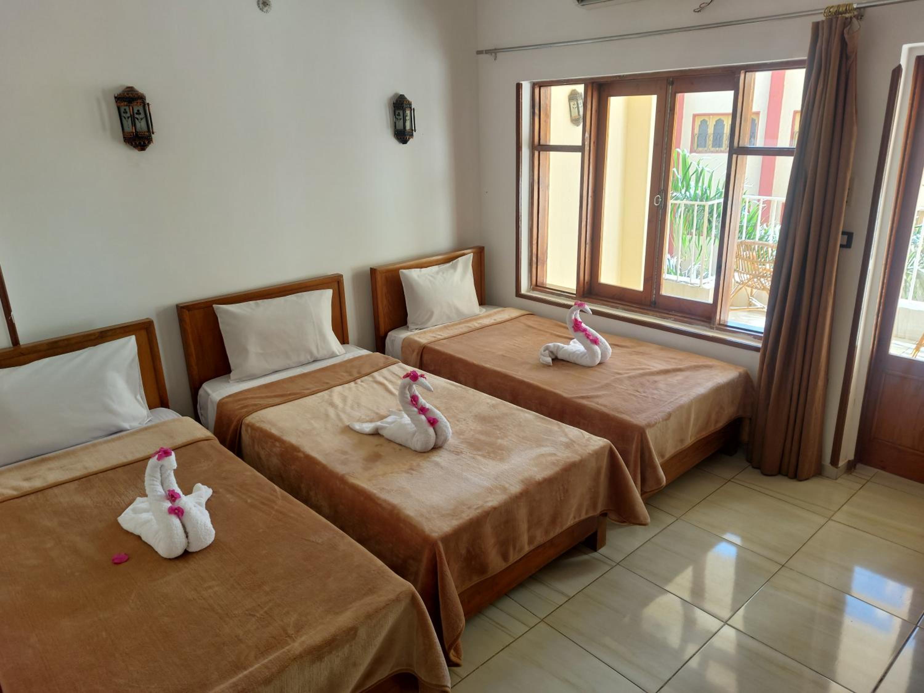 Triple Room with Garden View photo 2