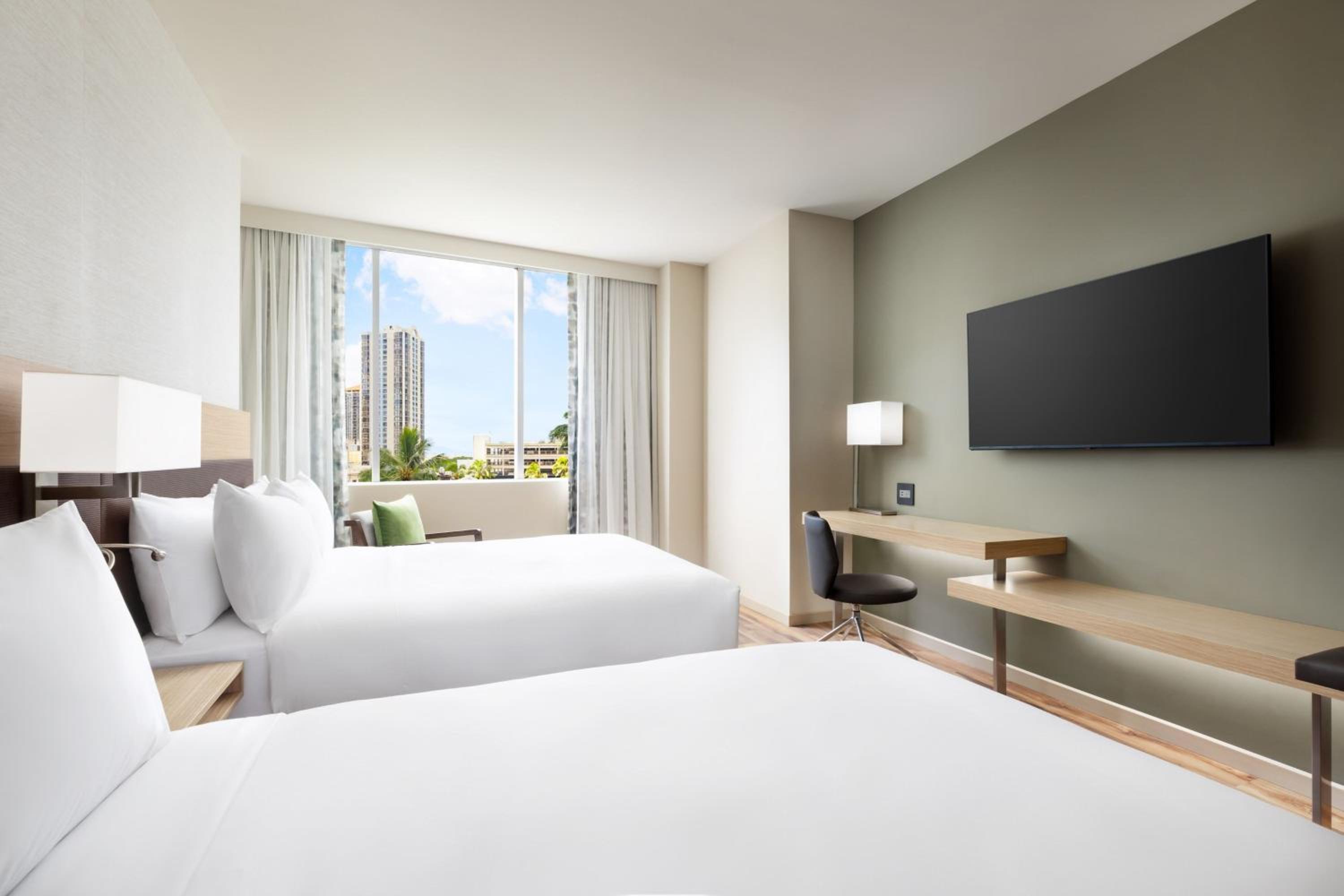 Deluxe Queen Room with Two Queen Beds and City View - Photo 1