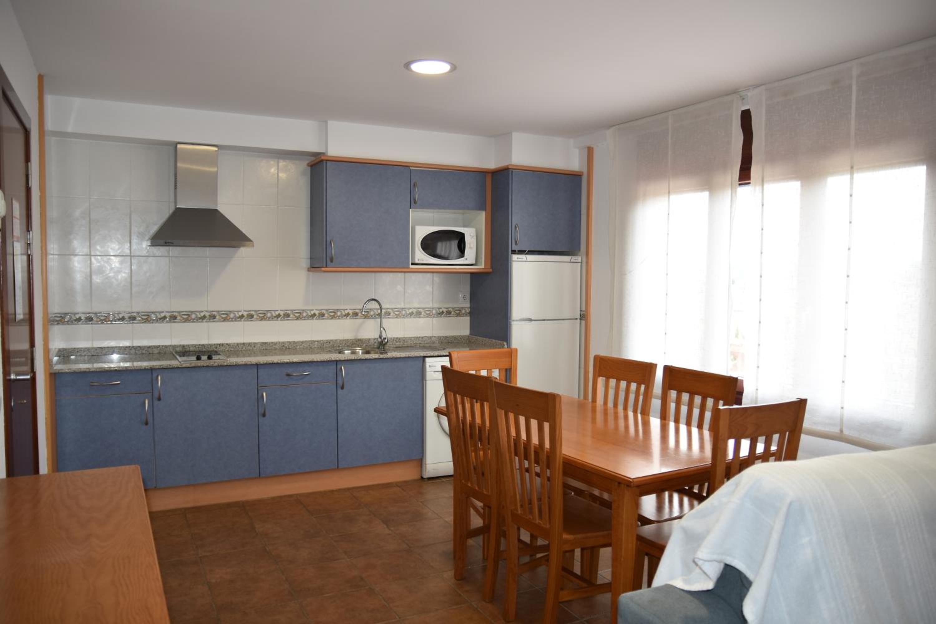 Apartment with Balcony - Photo 2