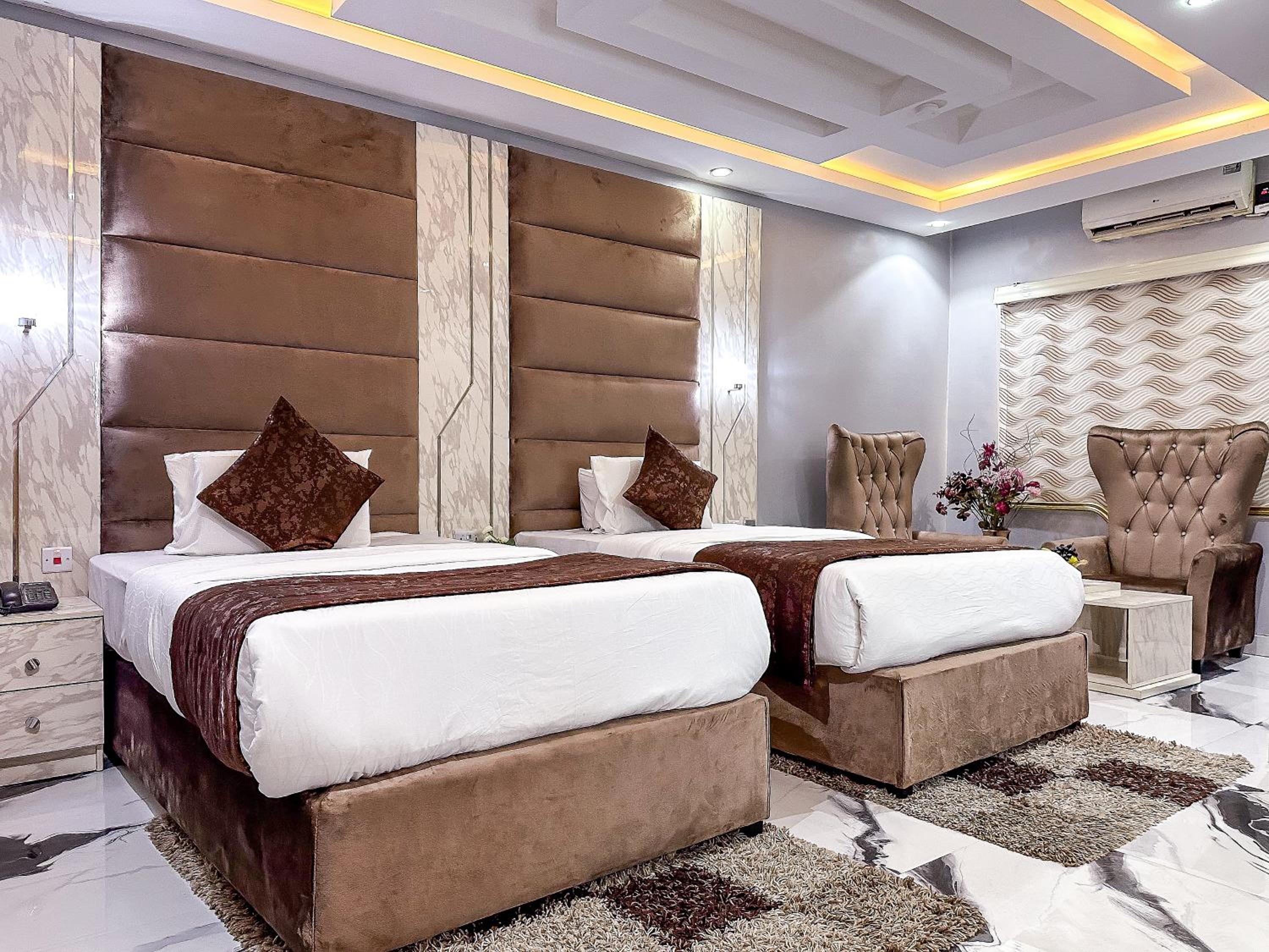 Deluxe Queen Room with Two Queen Beds photo 2