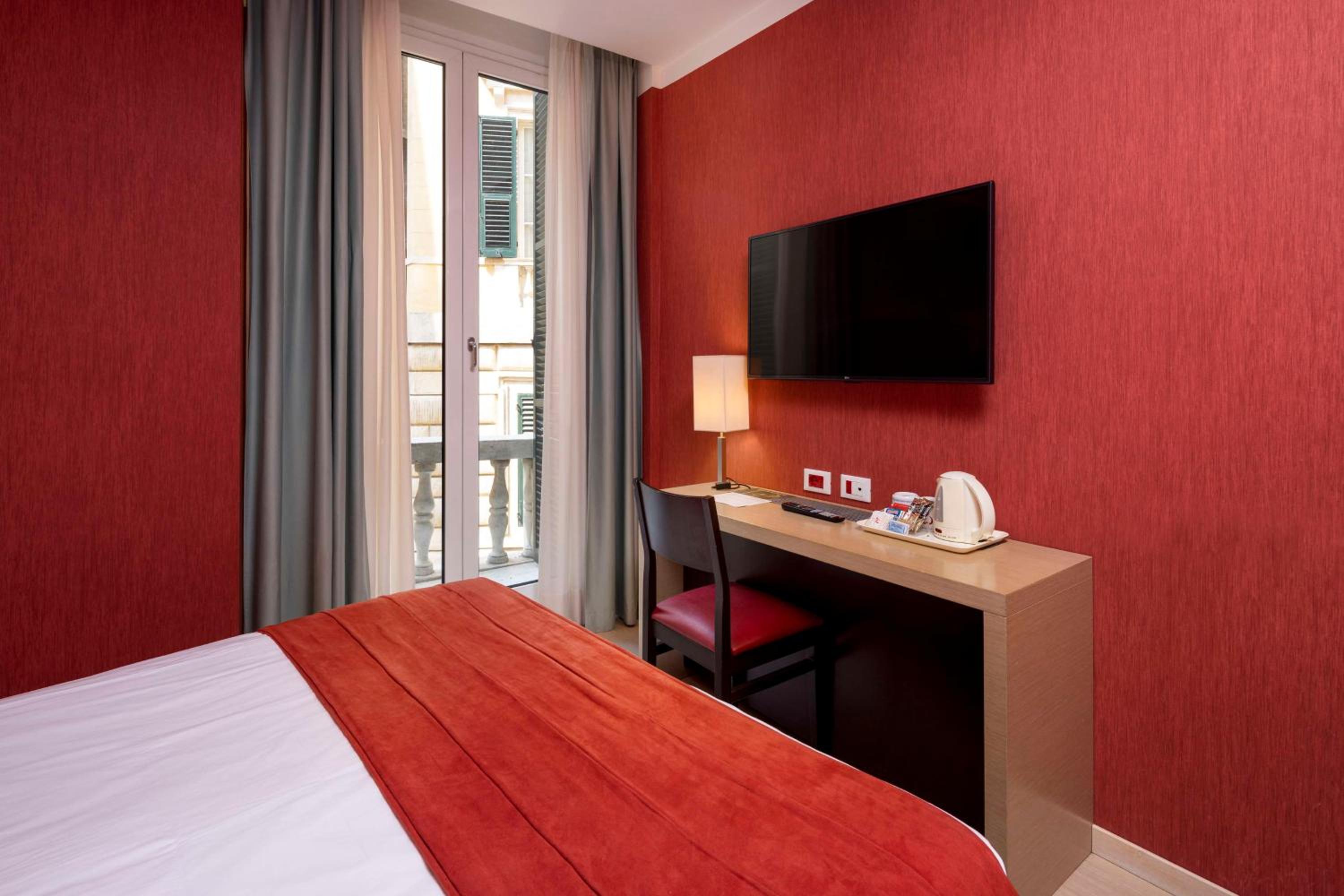 Deluxe King Room with Sofa Bed - Photo 9