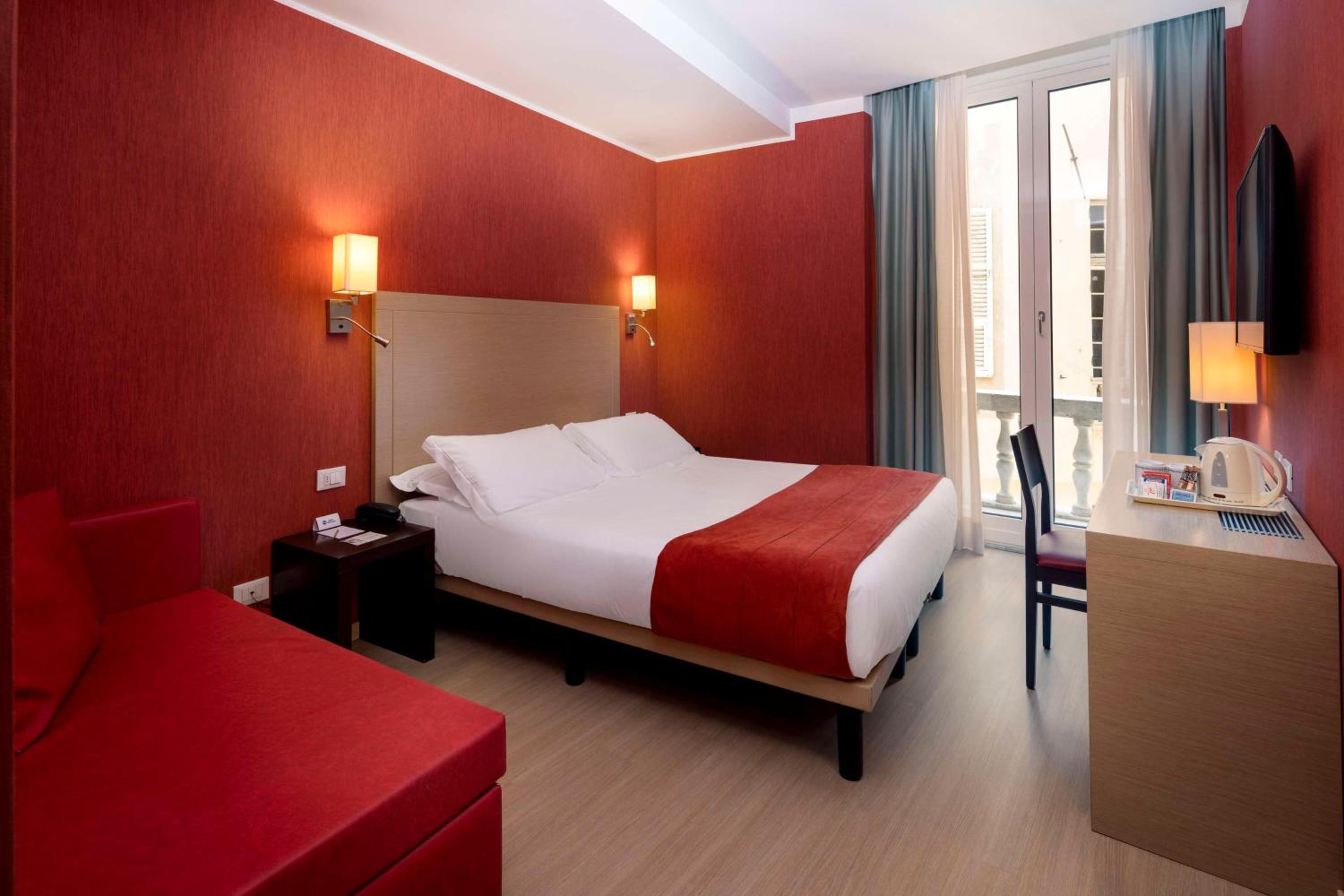 Deluxe King Room with Sofa Bed - Photo 1