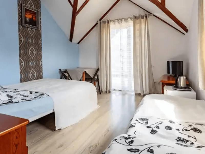 Deluxe Double Room (2 Adults + 1 Child) photo 2