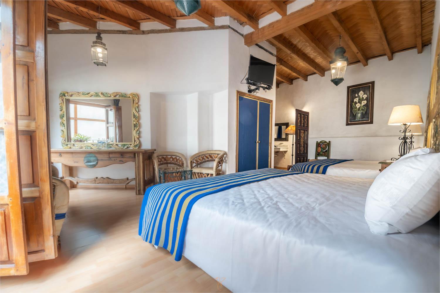 Deluxe Queen Room With Two Queen Beds photo 2