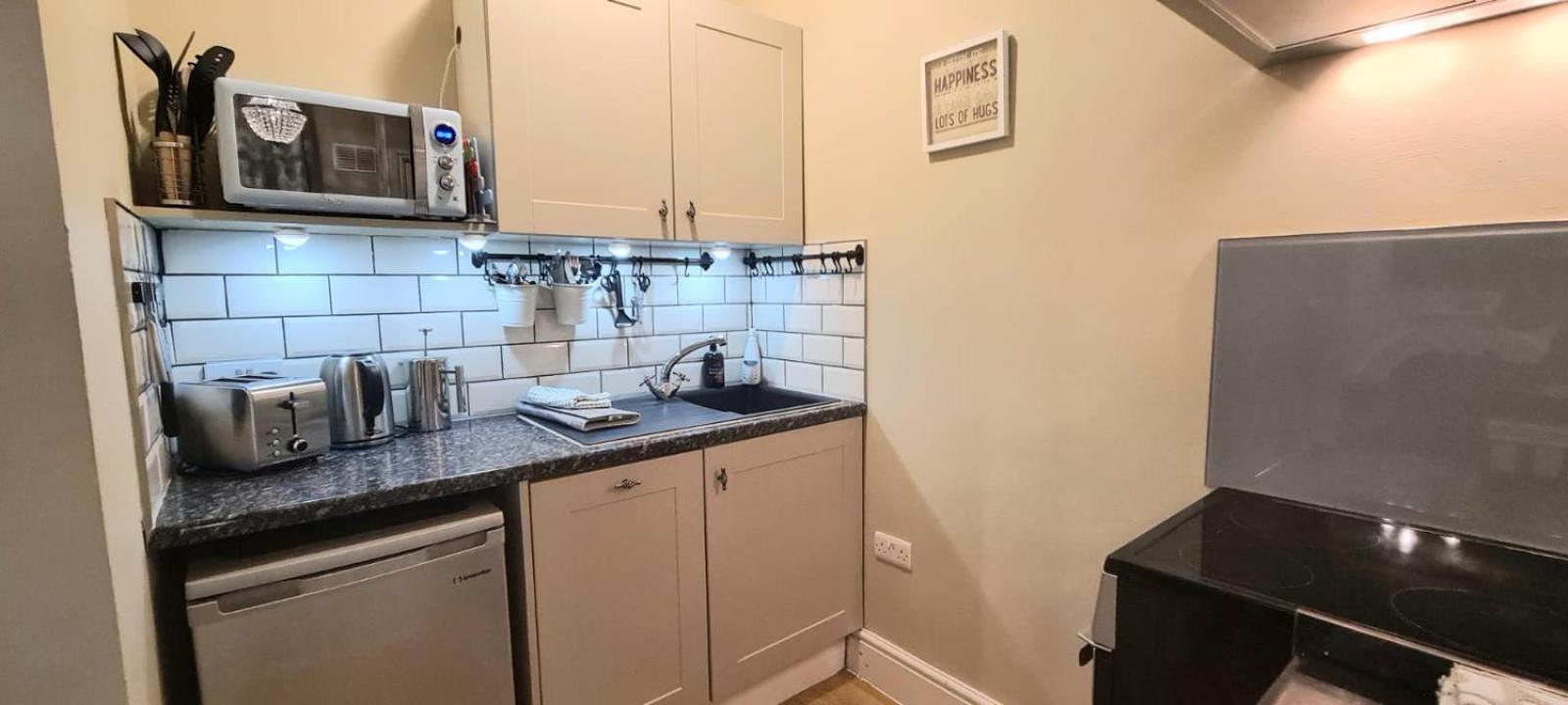 Three-Bedroom Apartment - Photo 13