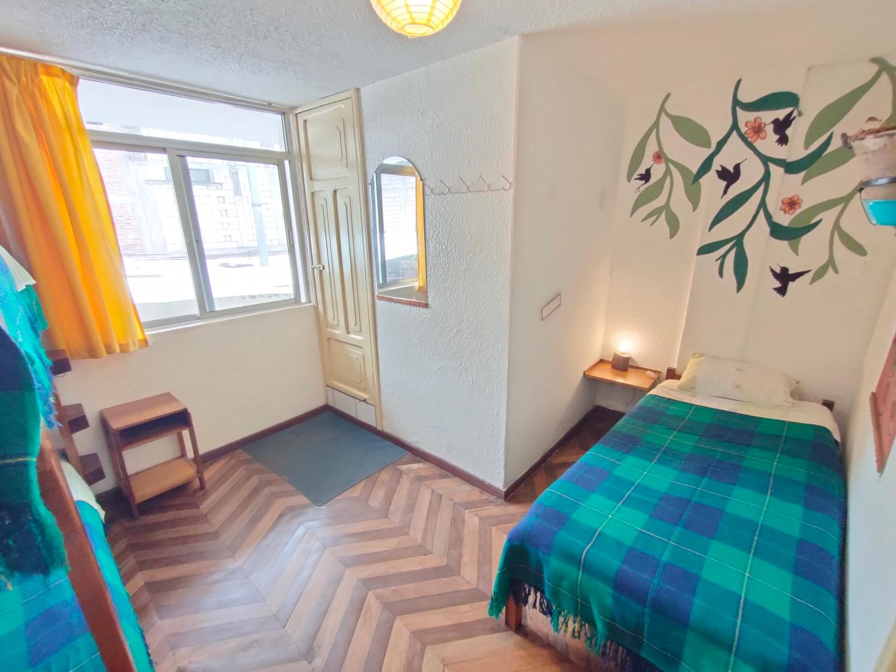 Single Bed In Dormitory Room