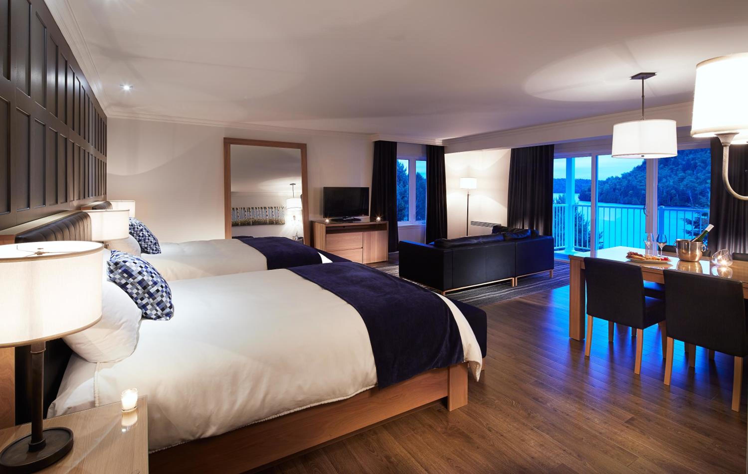 Deluxe Queen Room with Two Queen Beds - Photo 1