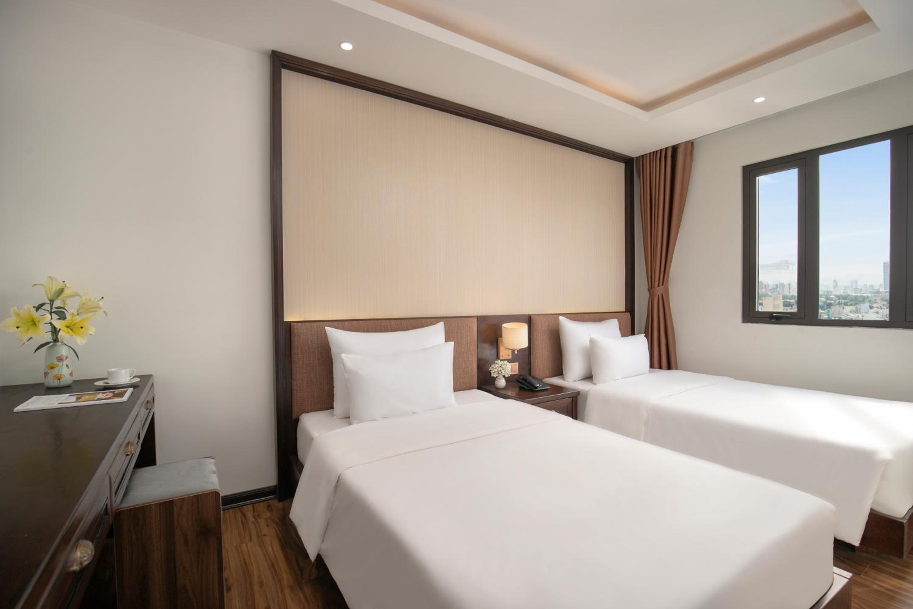 Family Suite with Balcony and City View - Photo 1